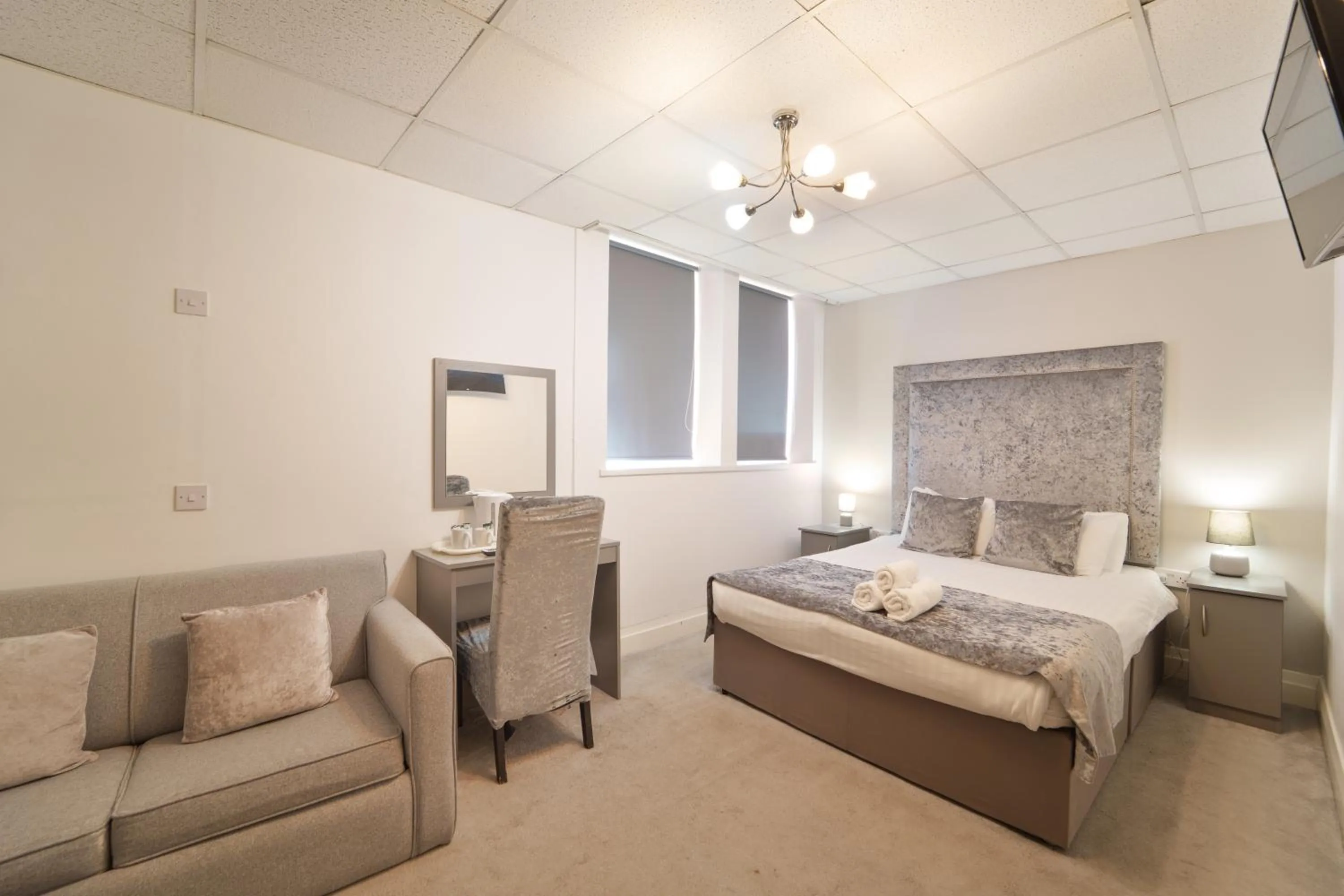 Bed in The Royal Boston Hotel by Compass Hospitality