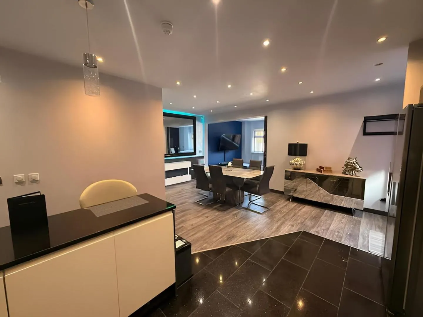 Living room in The Royal Boston Hotel by Compass Hospitality