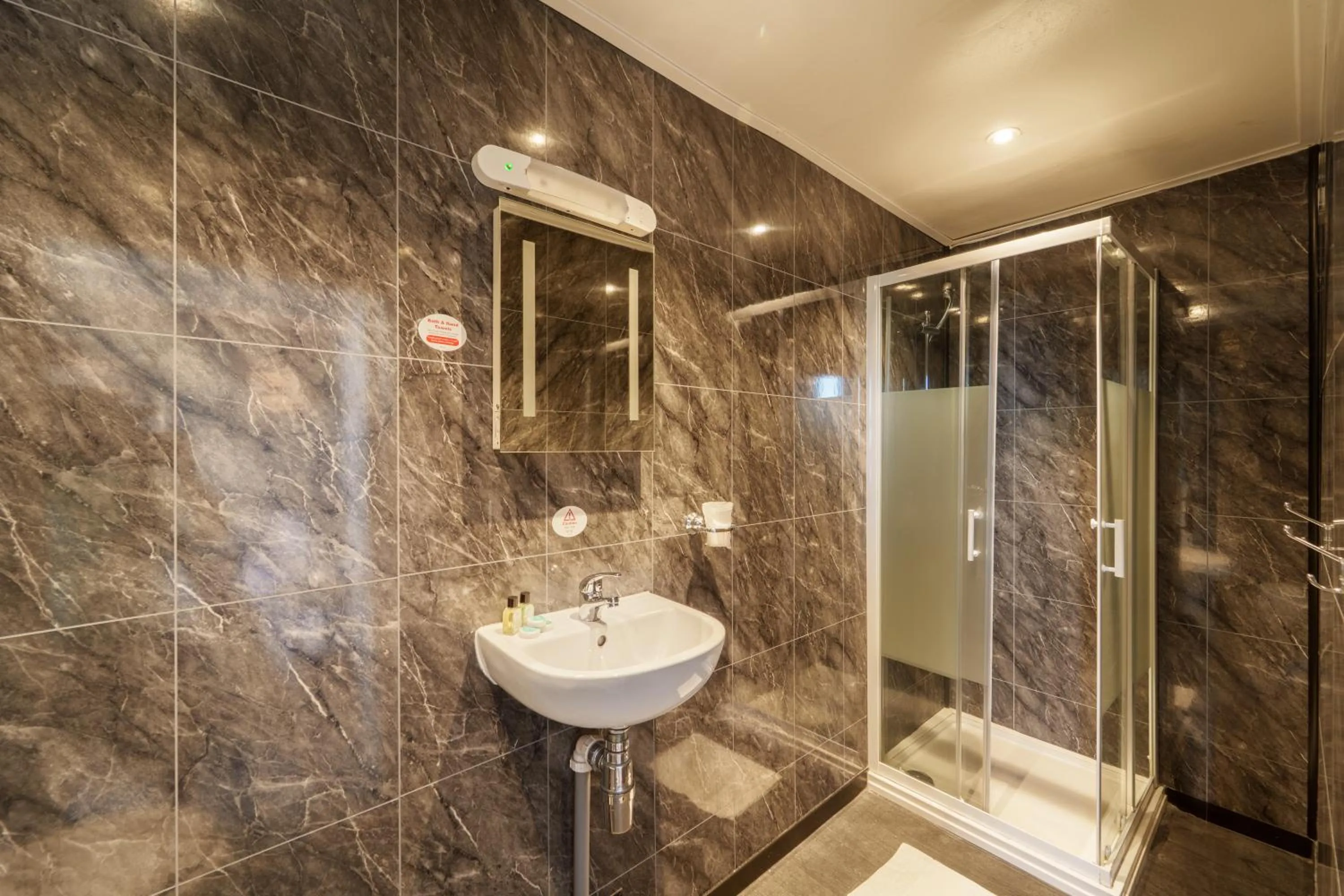 Shower in The Royal Boston Hotel by Compass Hospitality