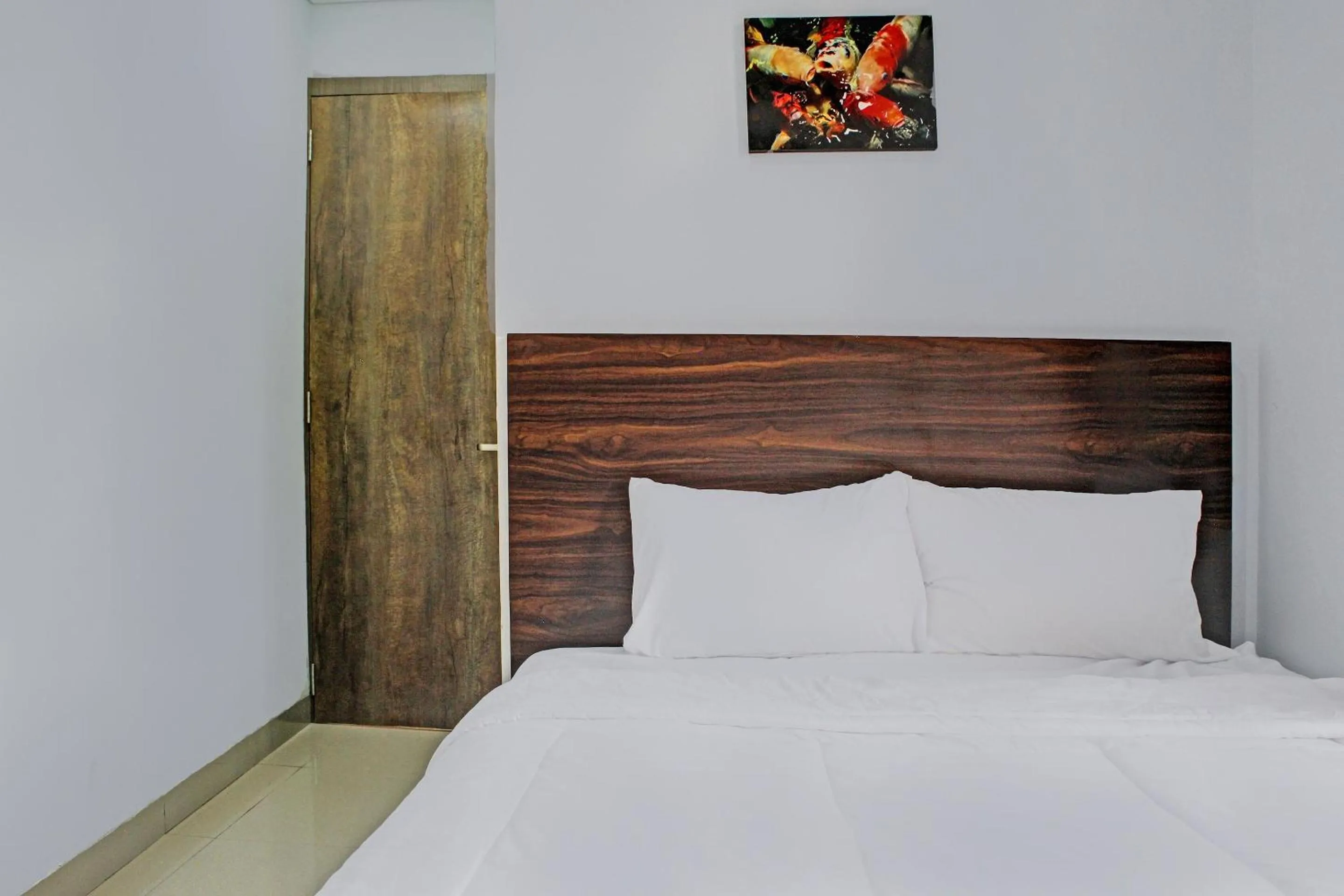 Bedroom in Capital O 92583 Raja Soeta Hostel Syariah