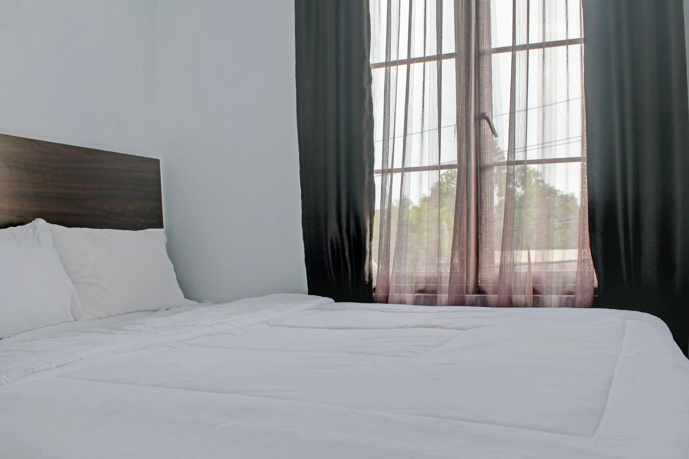 Bedroom in Capital O 92583 Raja Soeta Hostel Syariah