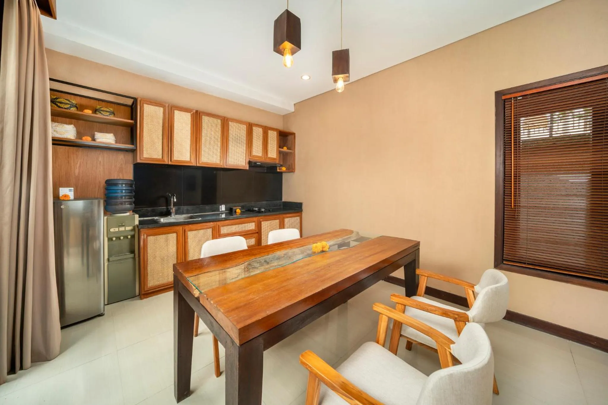 Kitchen or kitchenette in Canggu Circle Villa by Ini Vie Hospitality