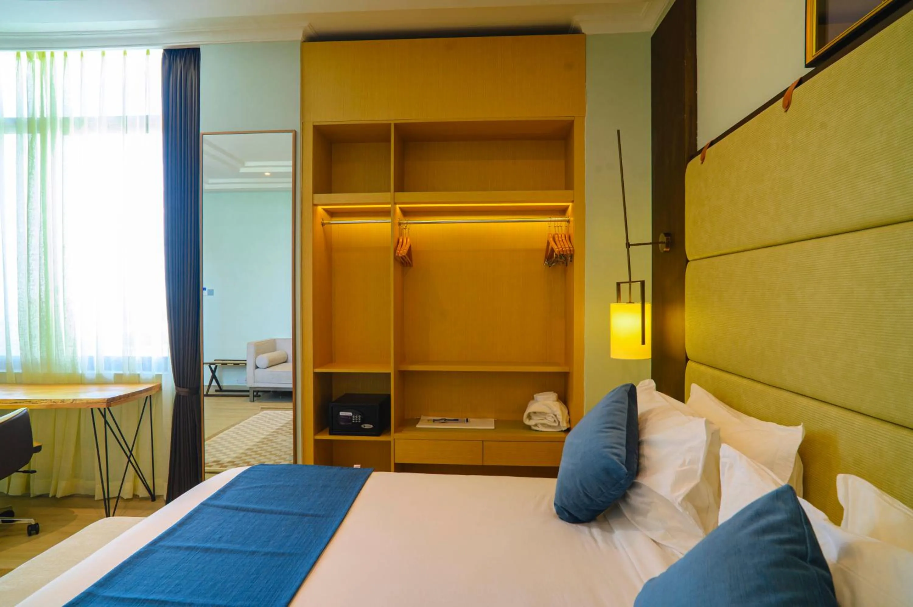 wardrobe, Bed in Best Western Dodoma City Hotel