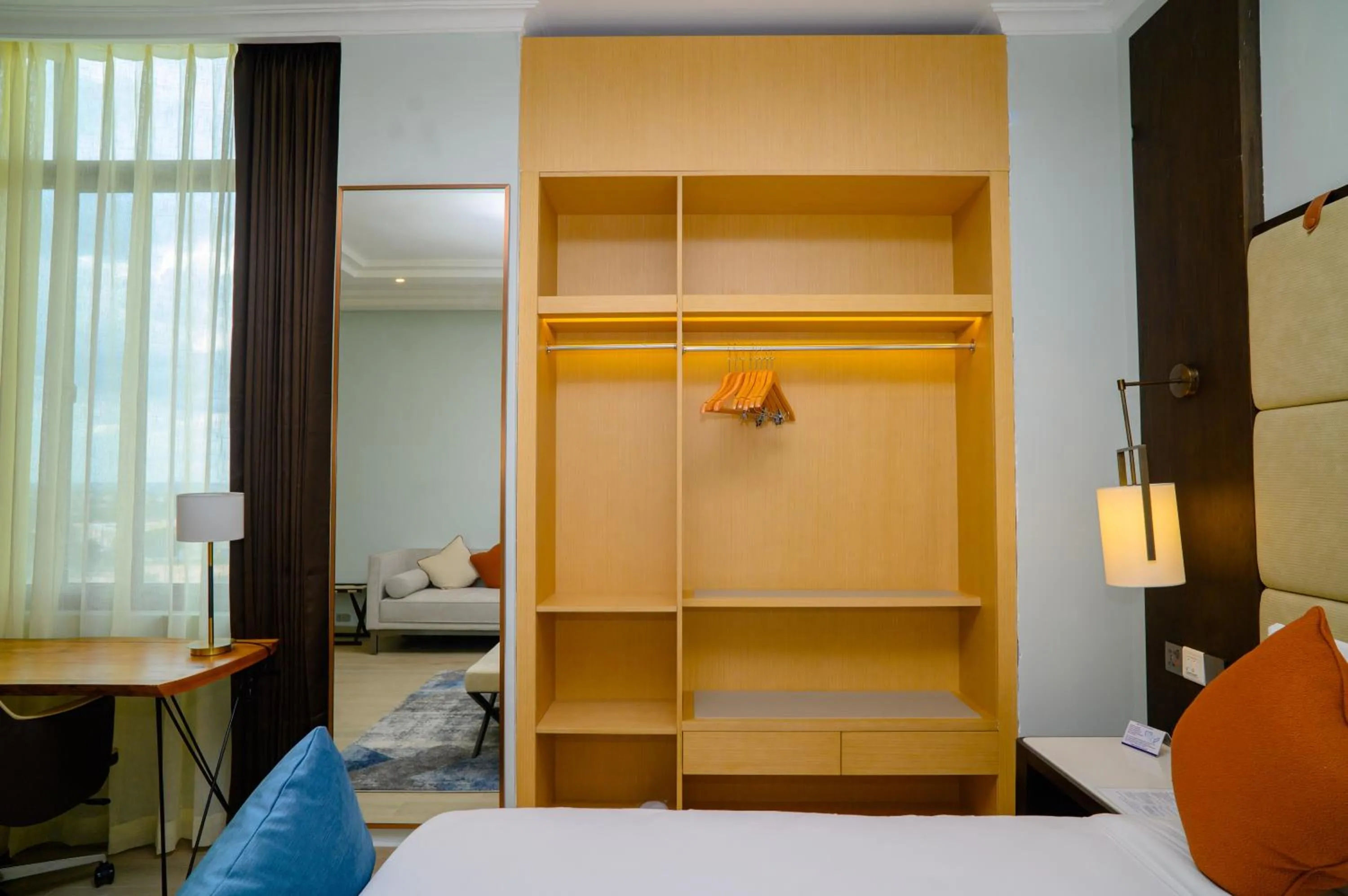 wardrobe, Bed in Best Western Dodoma City Hotel