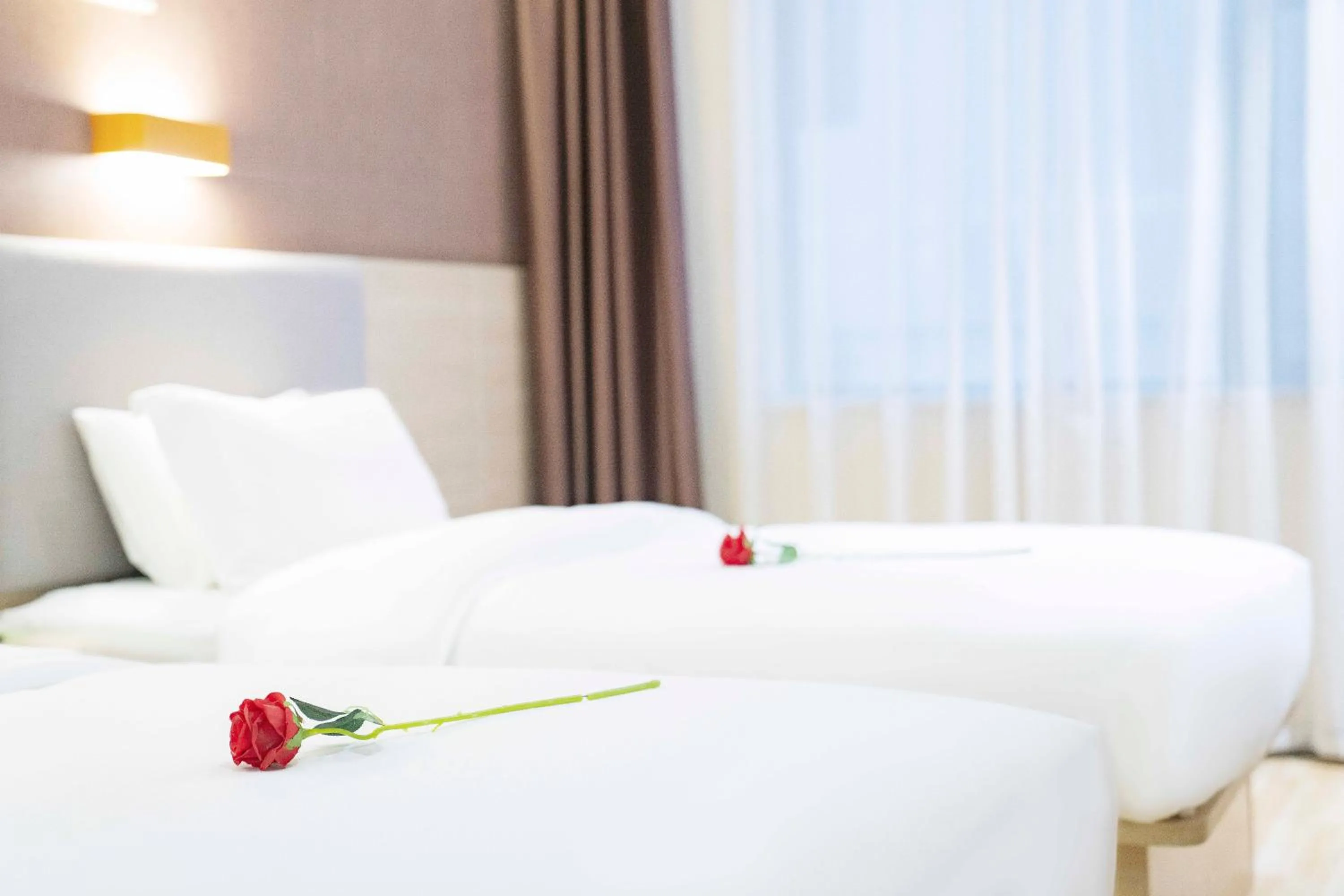 Photo of the whole room in 7 Days Premium - Kunming South High Speed Railway Station University Town Metro Station