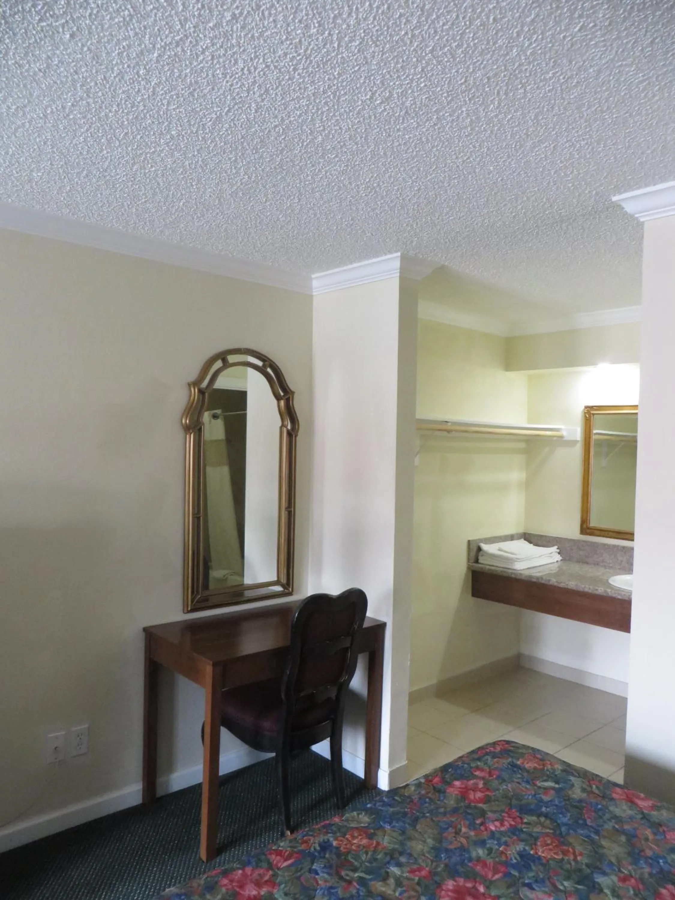 Decorative detail, Bed in National Inn Garden Grove