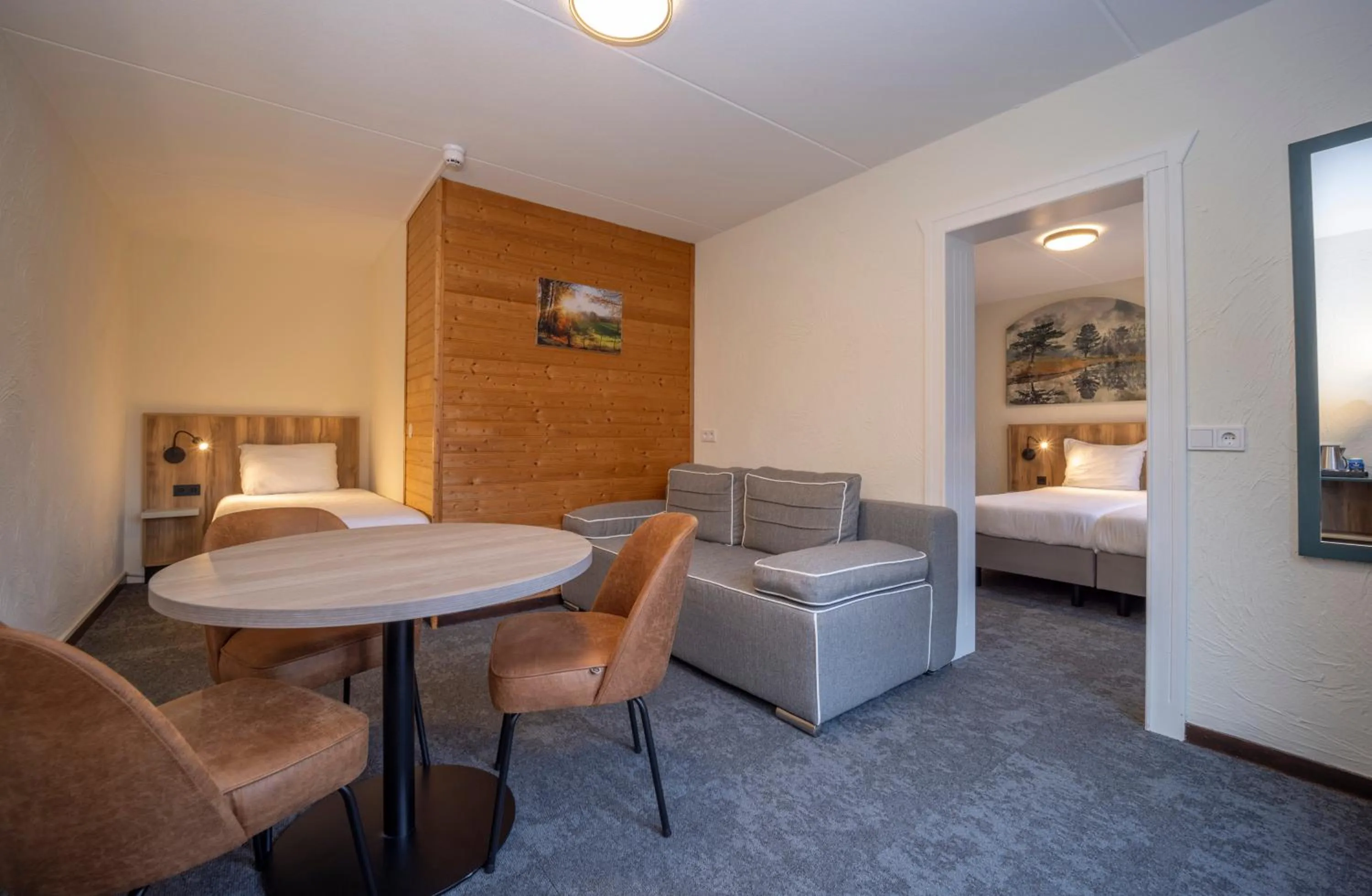 Living room, Bed in Fletcher Hotel-Restaurant de Witte Brug