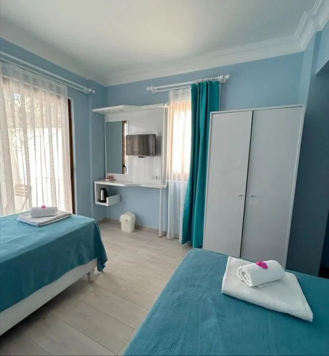 Bed in Marquis Blue Hotel