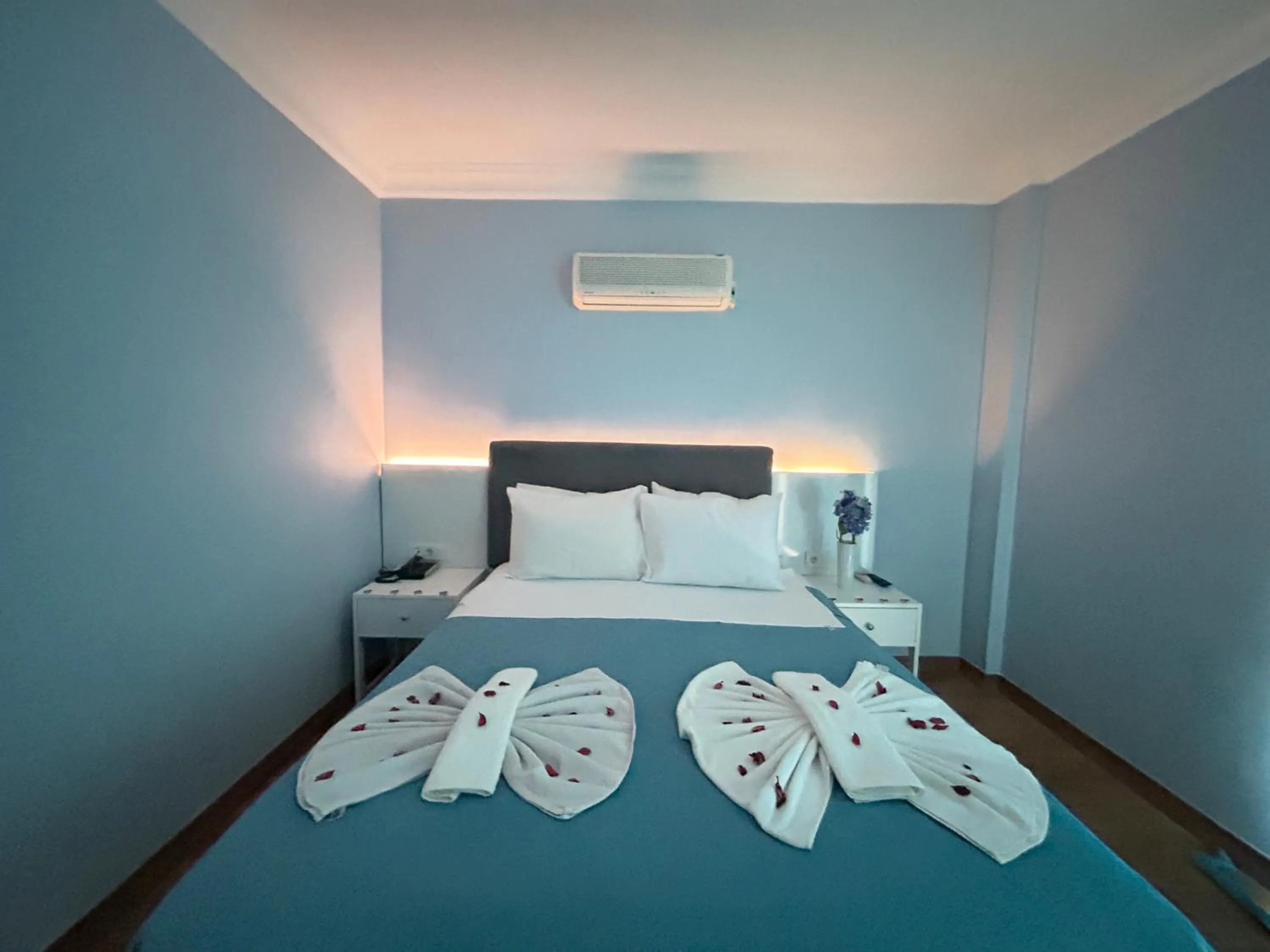 Bed in Marquis Blue Hotel