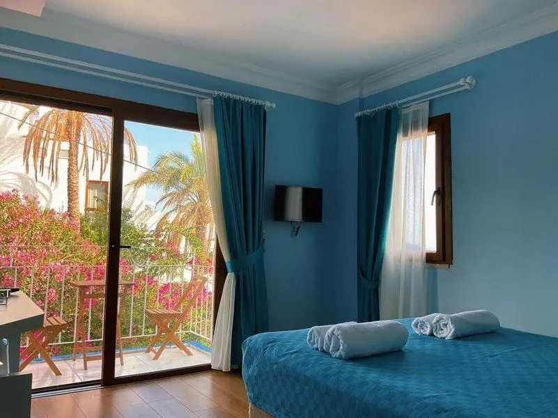 Bed in Marquis Blue Hotel