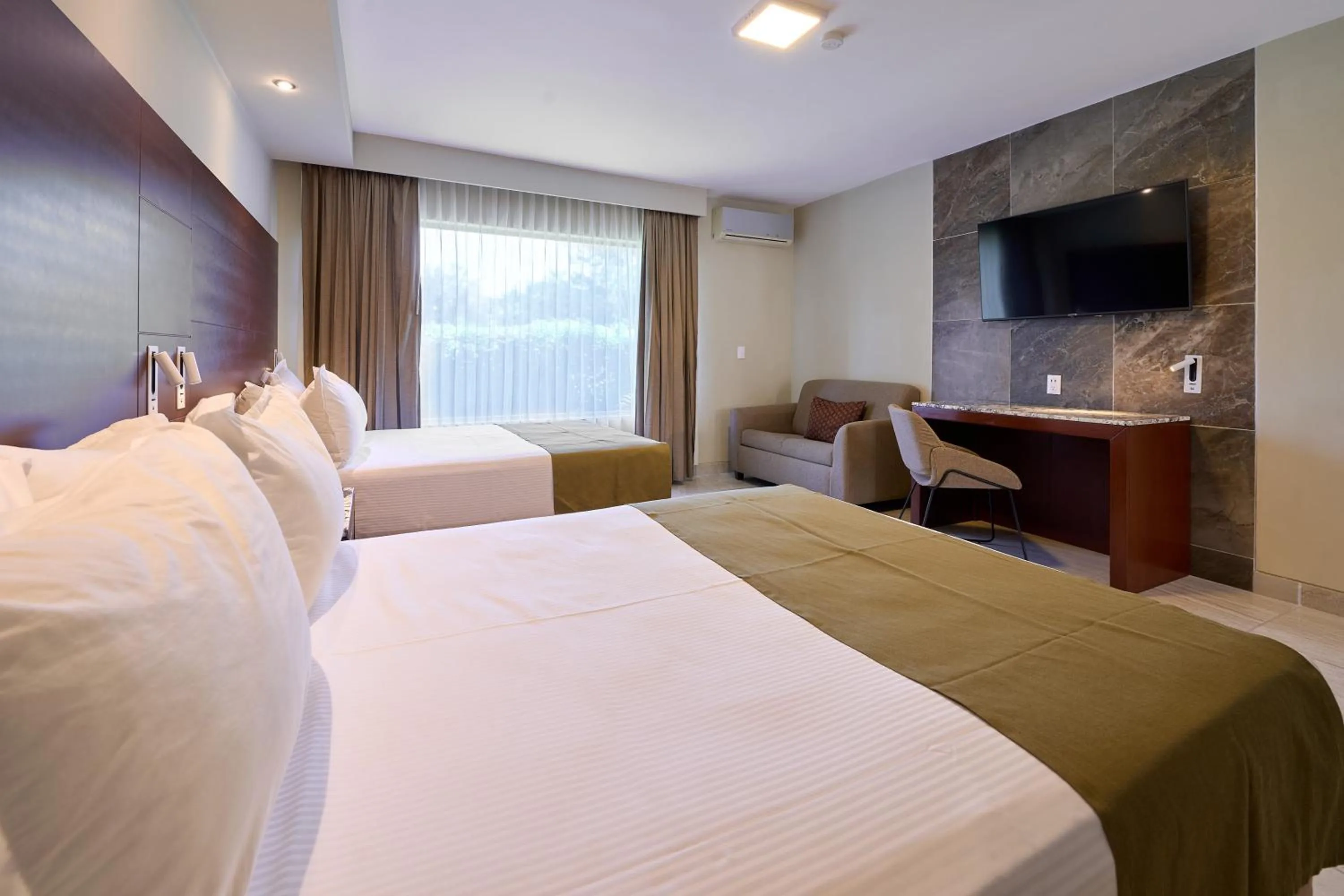 Bed in Hotel Estancia Business Class