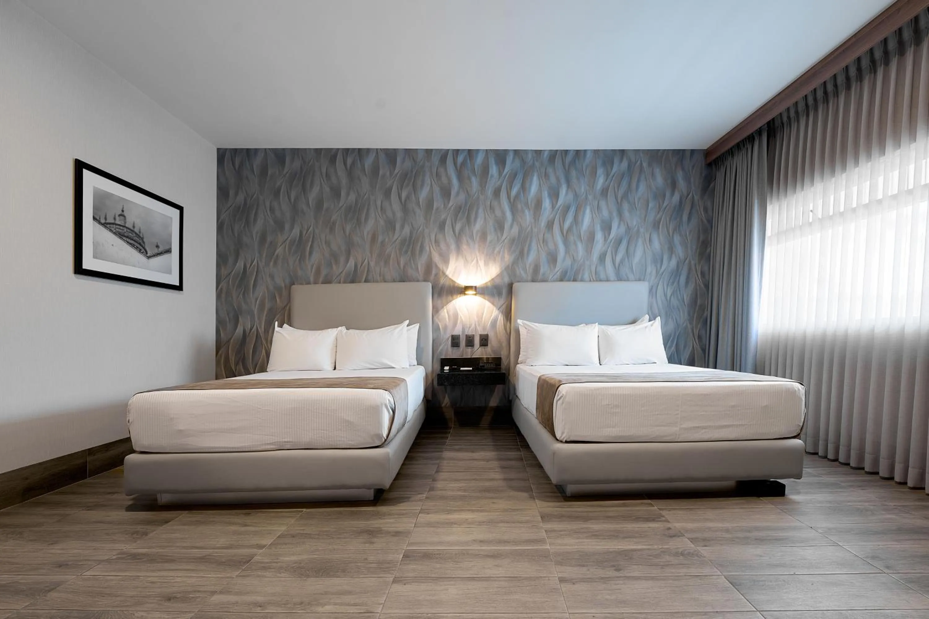 Bed in Hotel Estancia Business Class