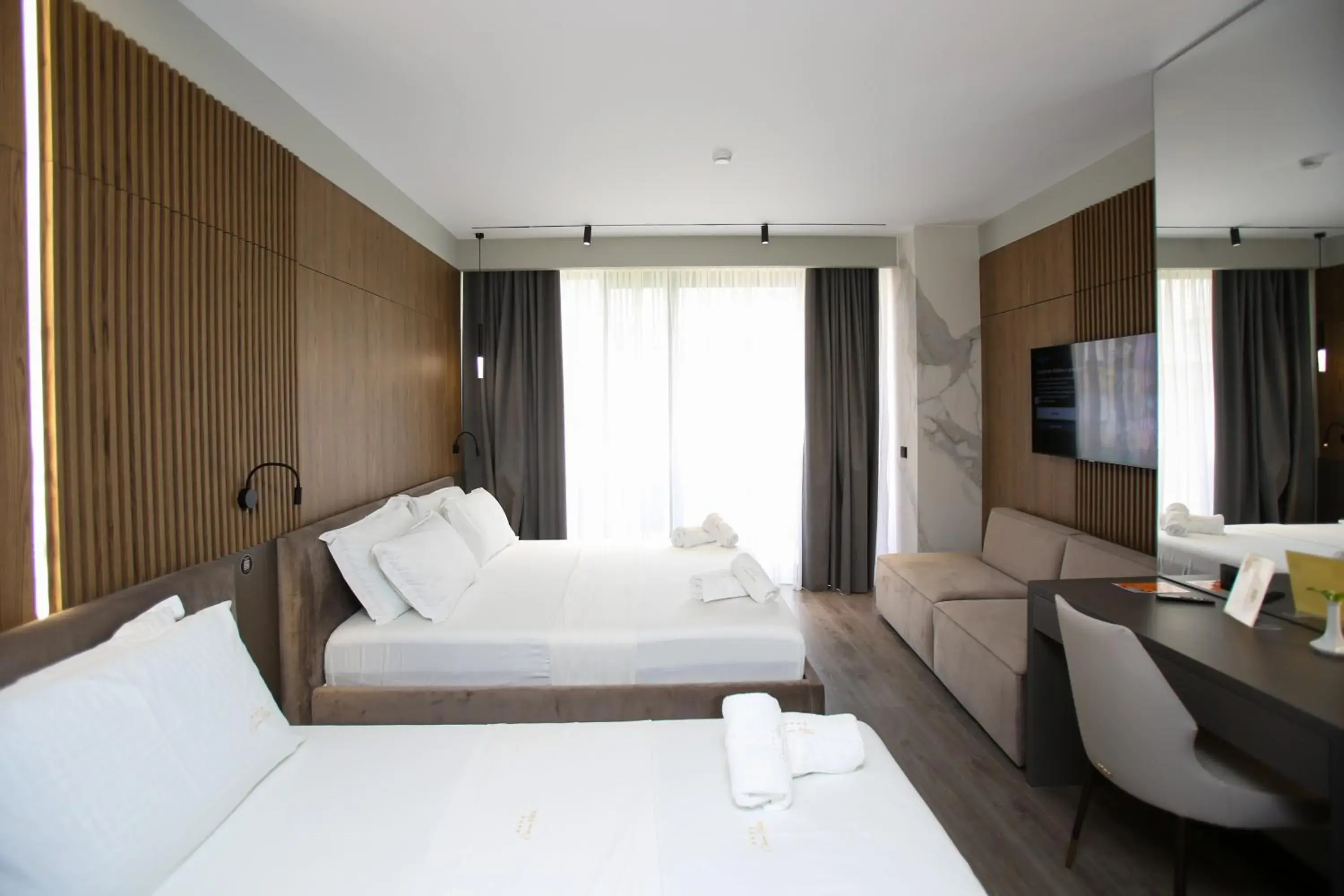 Deluxe Triple Room in Charm Hotel Deluxe Triple Room in Charm Hotel