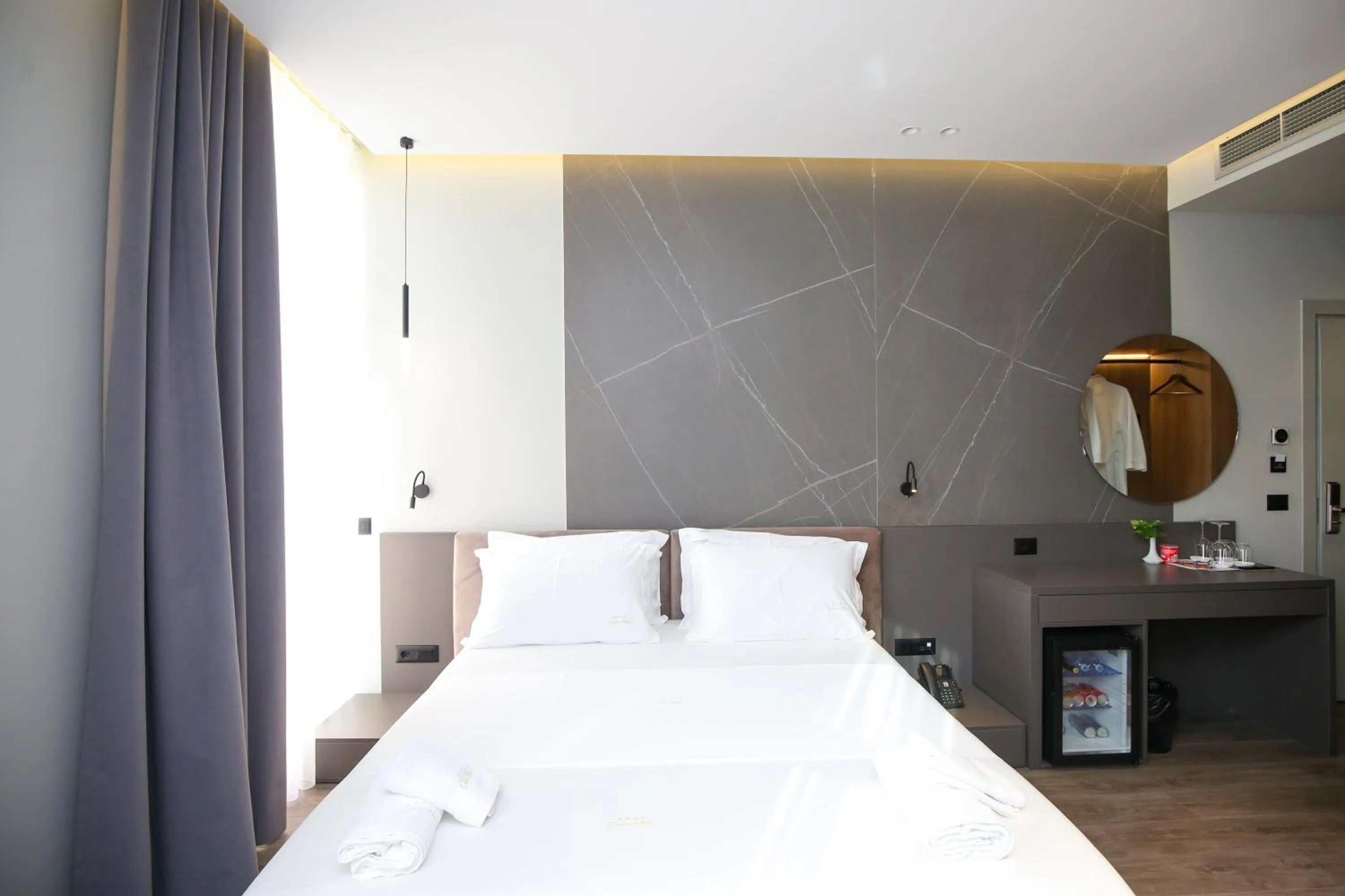 towels, Bed in Charm Hotel