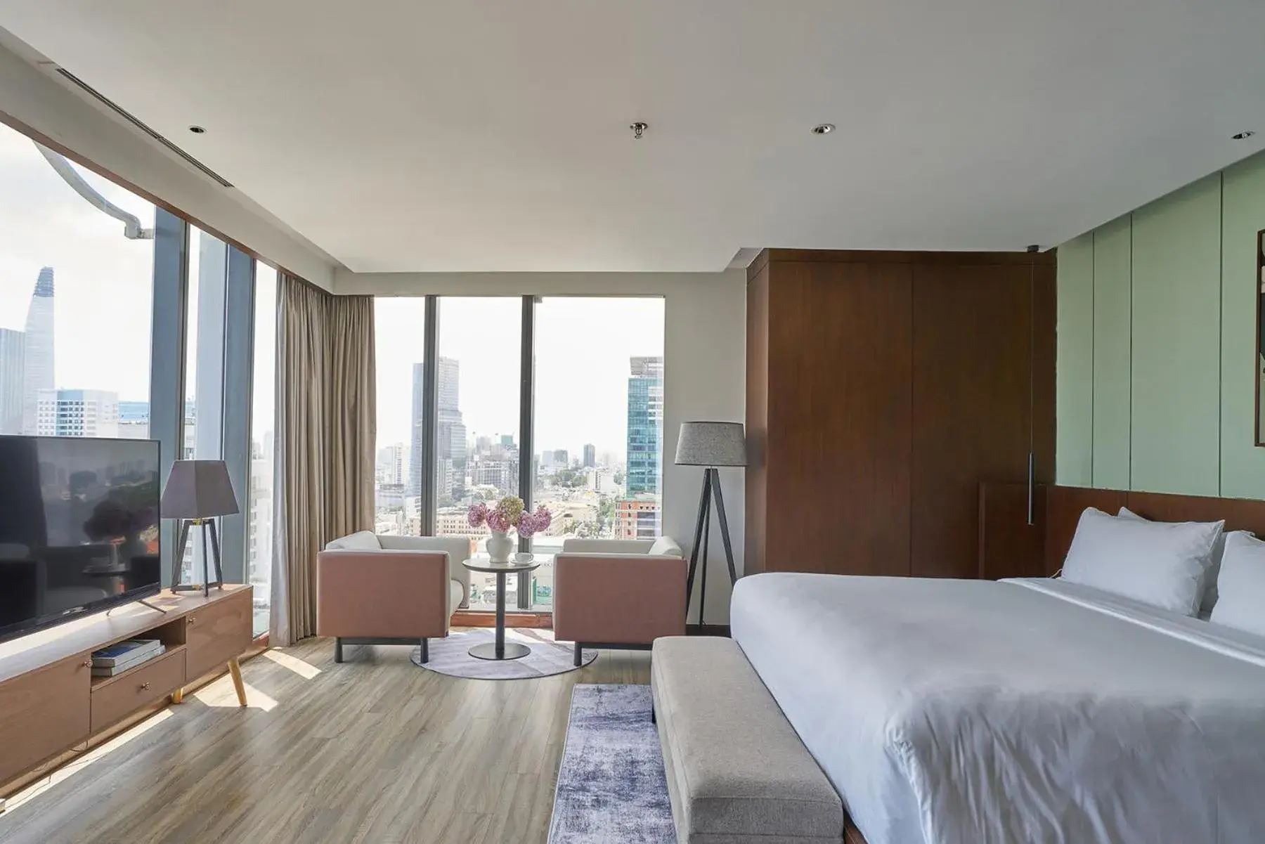 Communal lounge/ TV room, Bed in Signature by M Village Lê Thánh Tôn Communal lounge/ TV room, Bed in Signature by M Village Lê Thánh Tôn