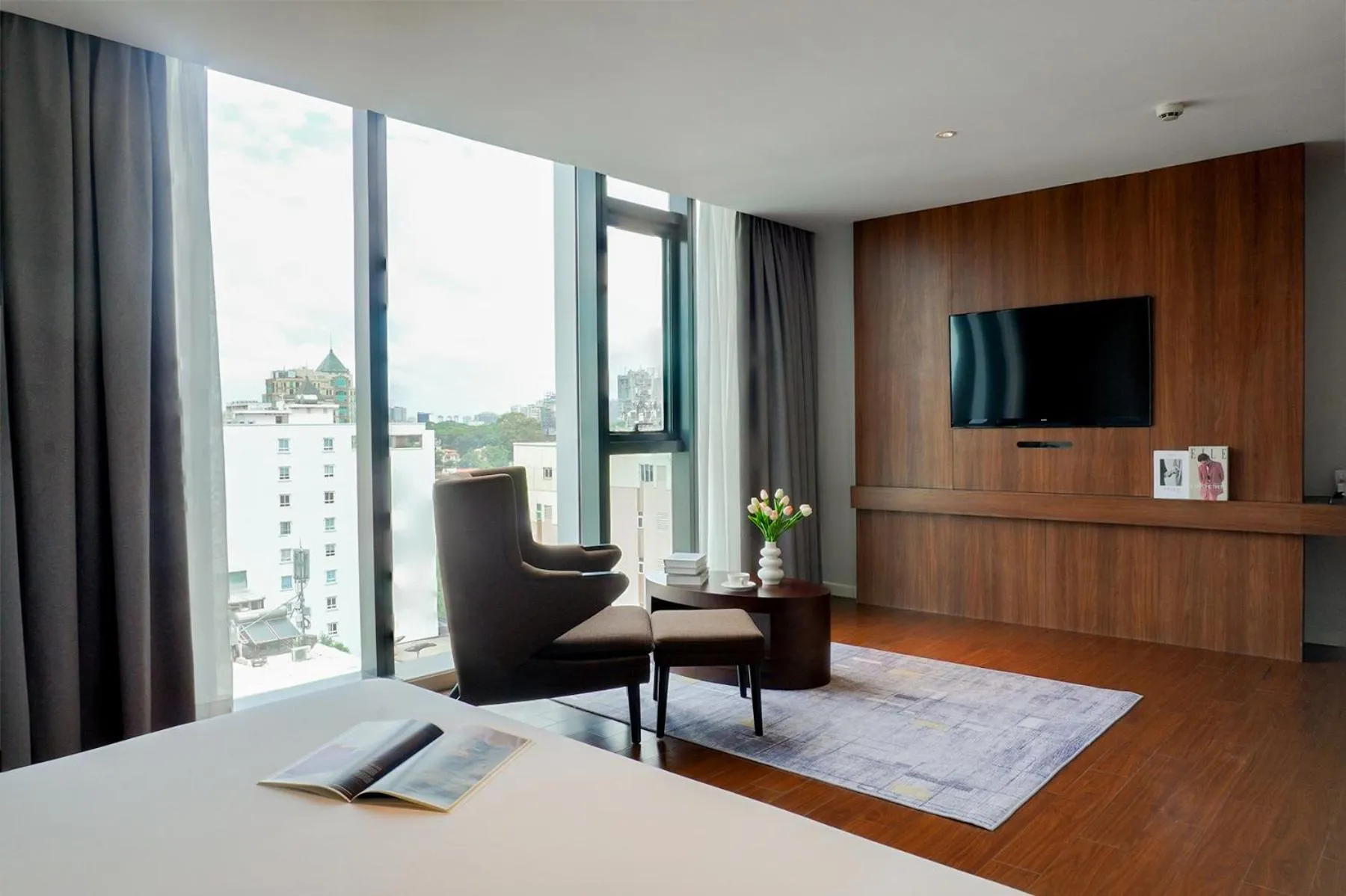 Seating area, Bed in Signature by M Village Lê Thánh Tôn