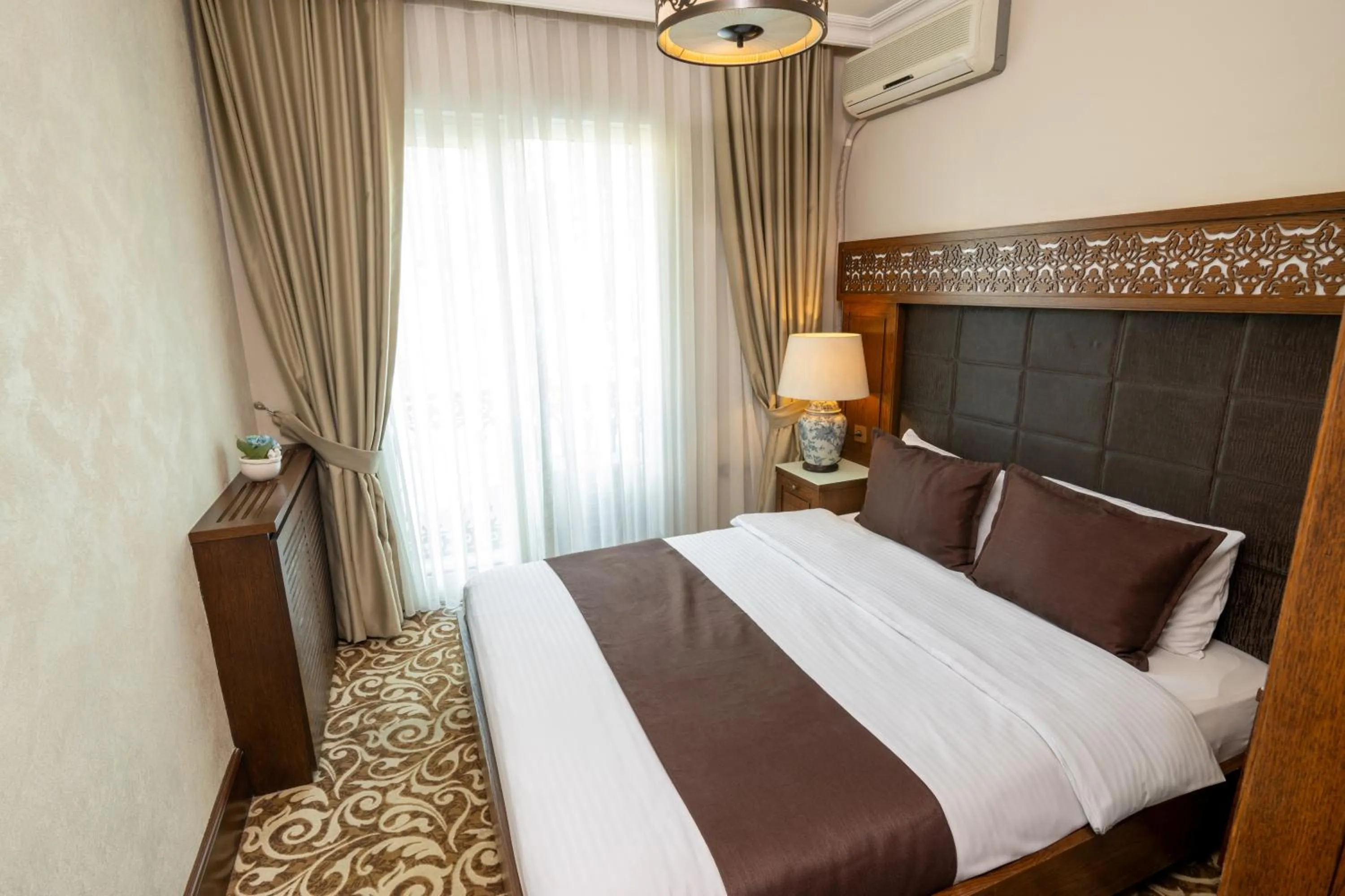 Bed in Şişli Luxury K Suites Hotel