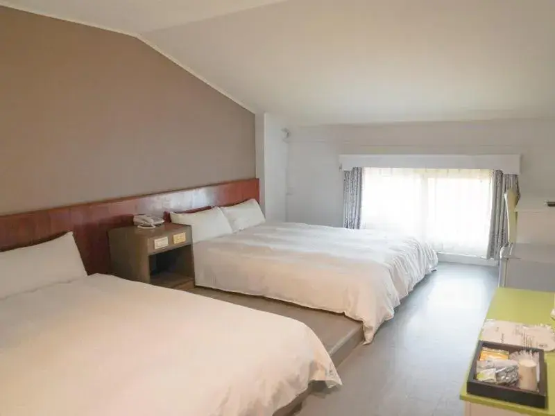 Bed in Dan Lee Inn Bed in Dan Lee Inn