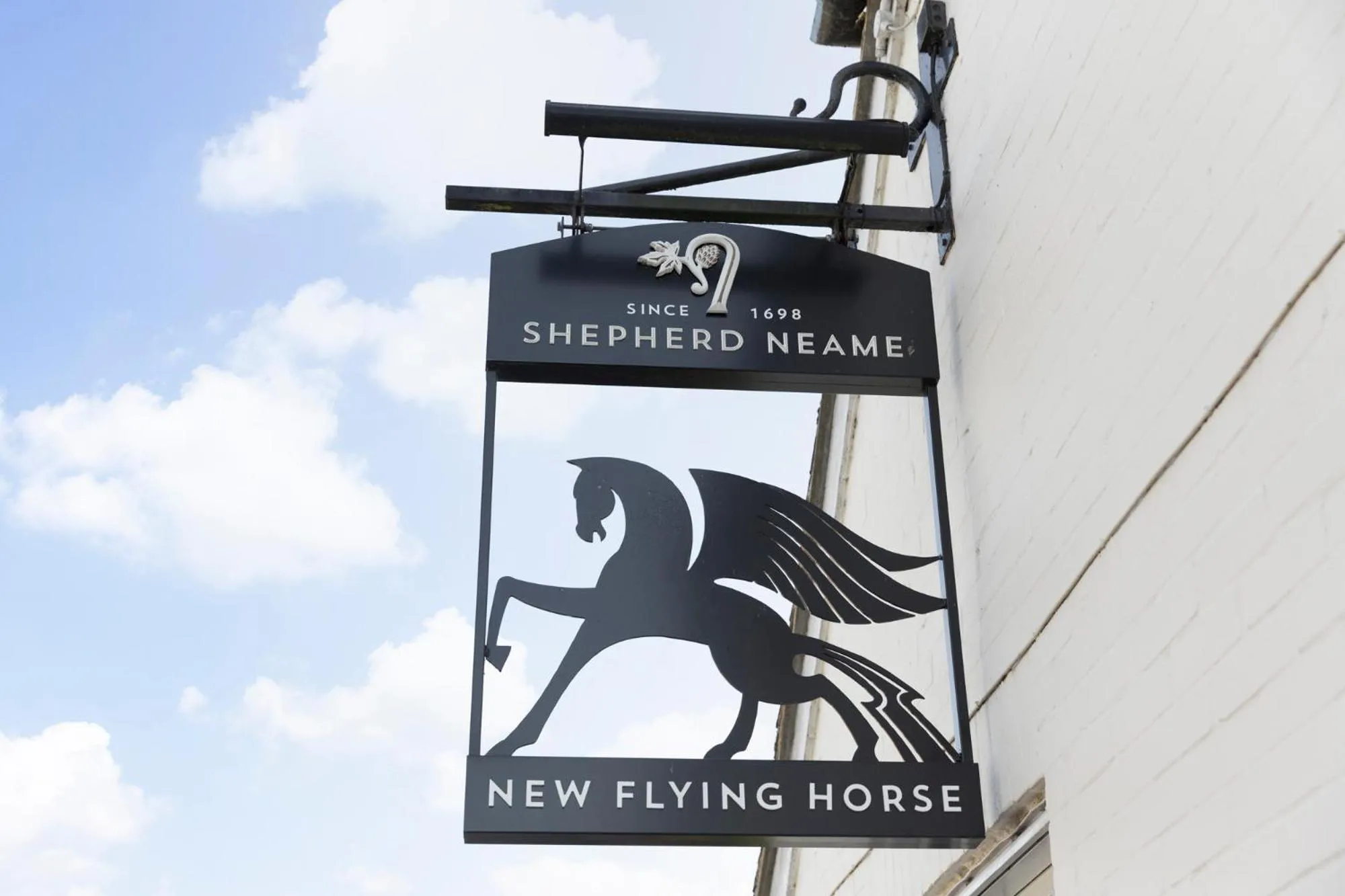 Property logo or sign in New Flying Horse Inn