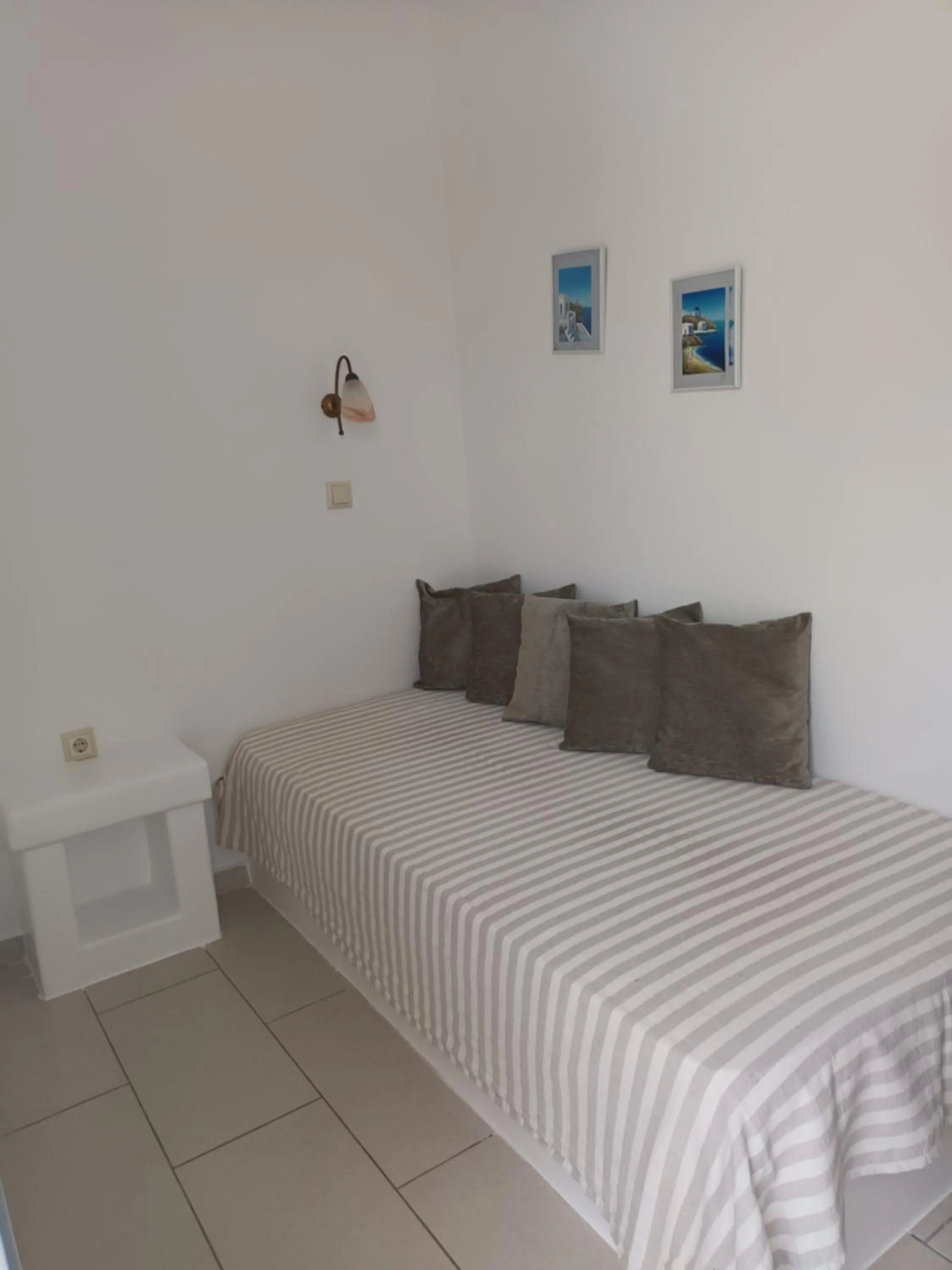 Seating area, Bed in Theofanis Studios