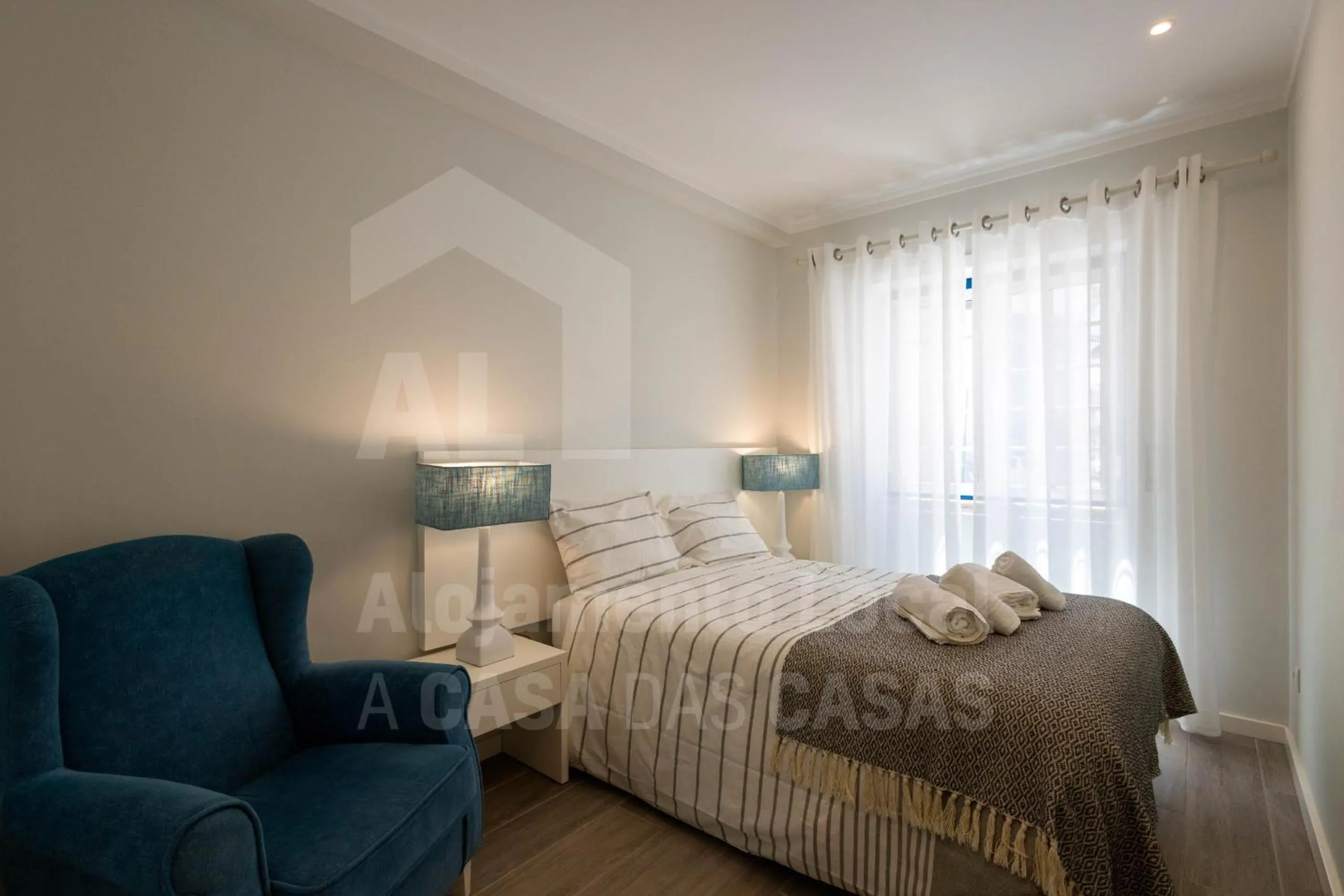 Bed in Ribas Apartment by ACasaDasCasas