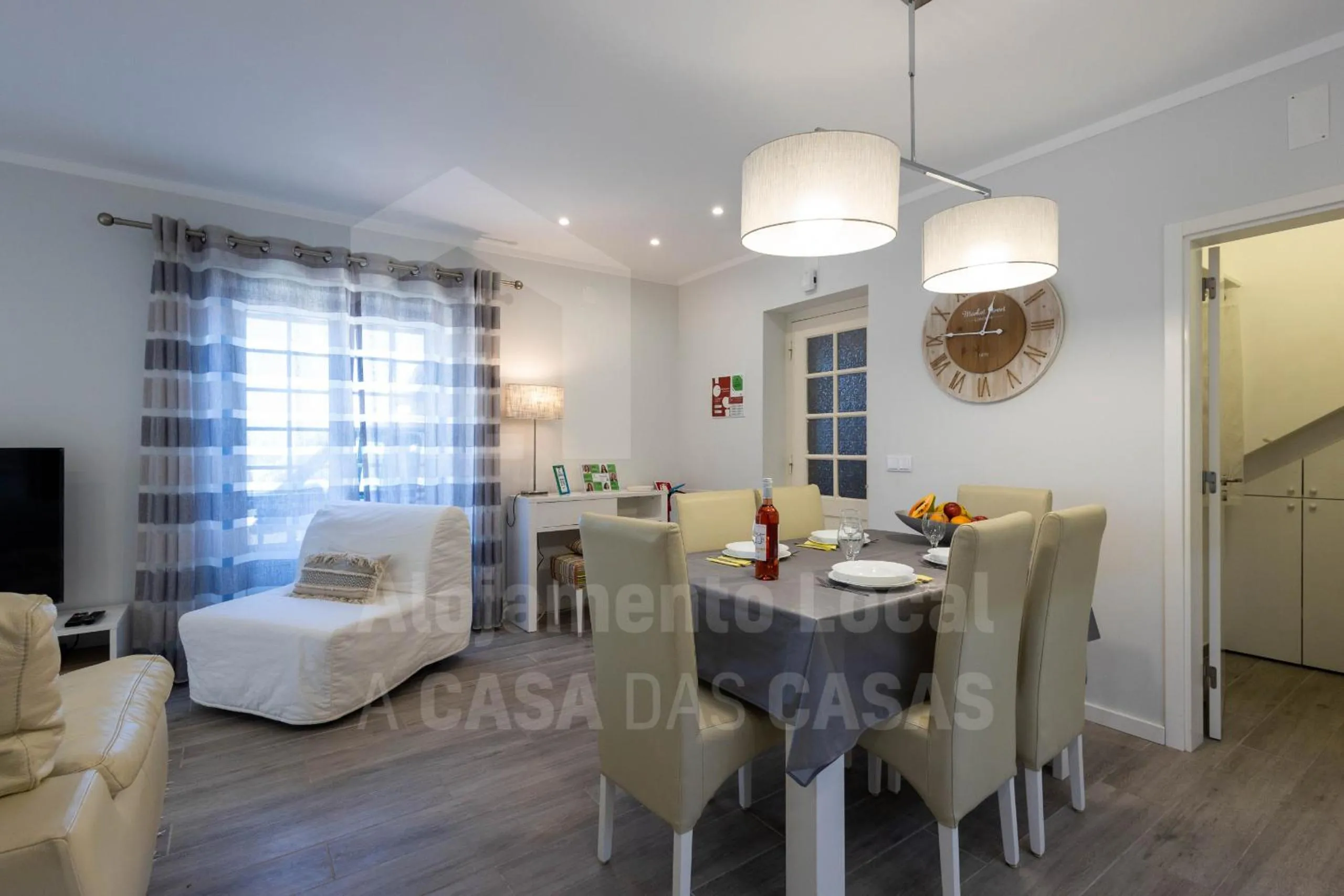 Communal lounge/ TV room in Ribas Apartment by ACasaDasCasas