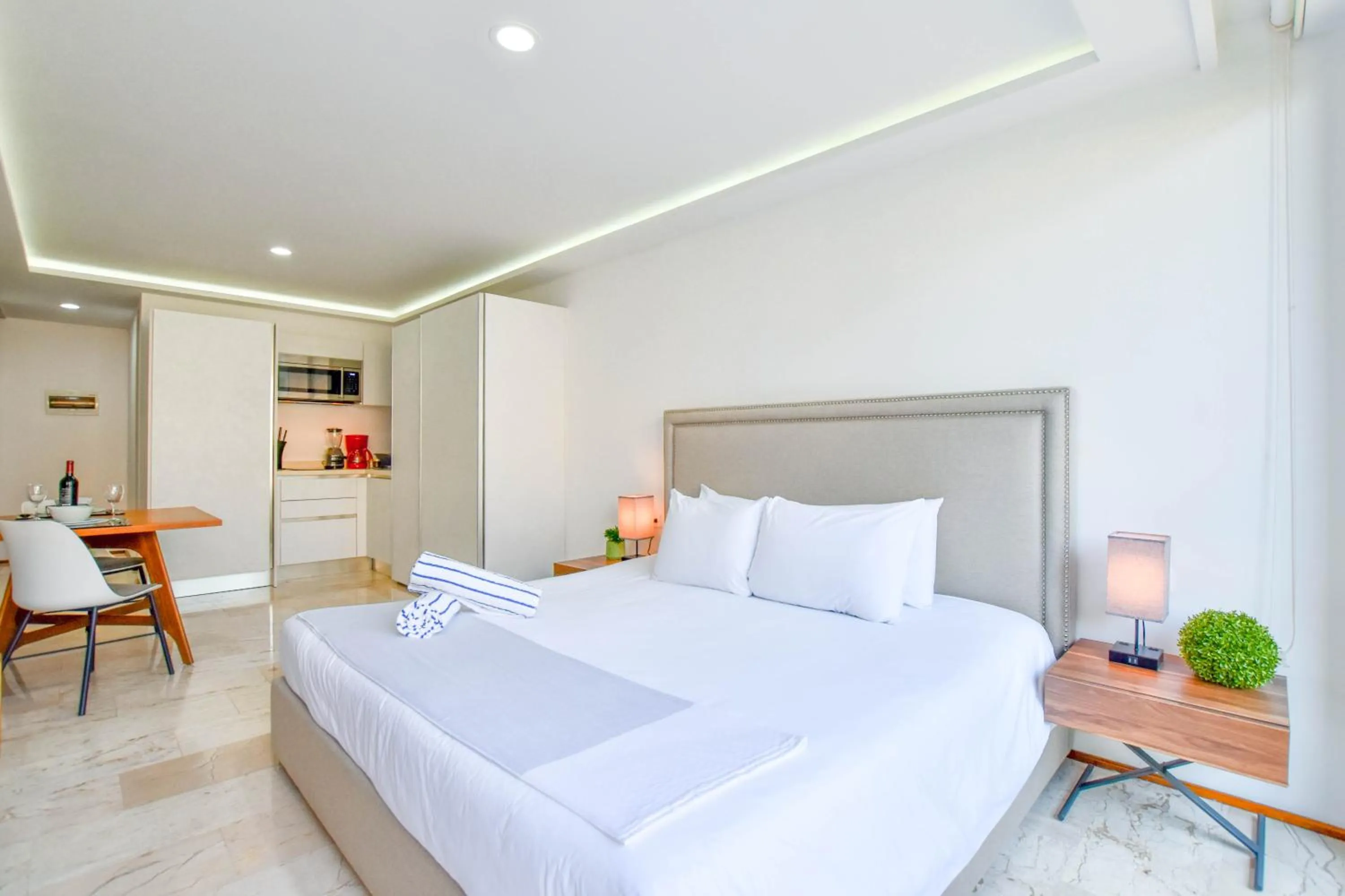 Bedroom, Bed in OP downtown Studio by Casago