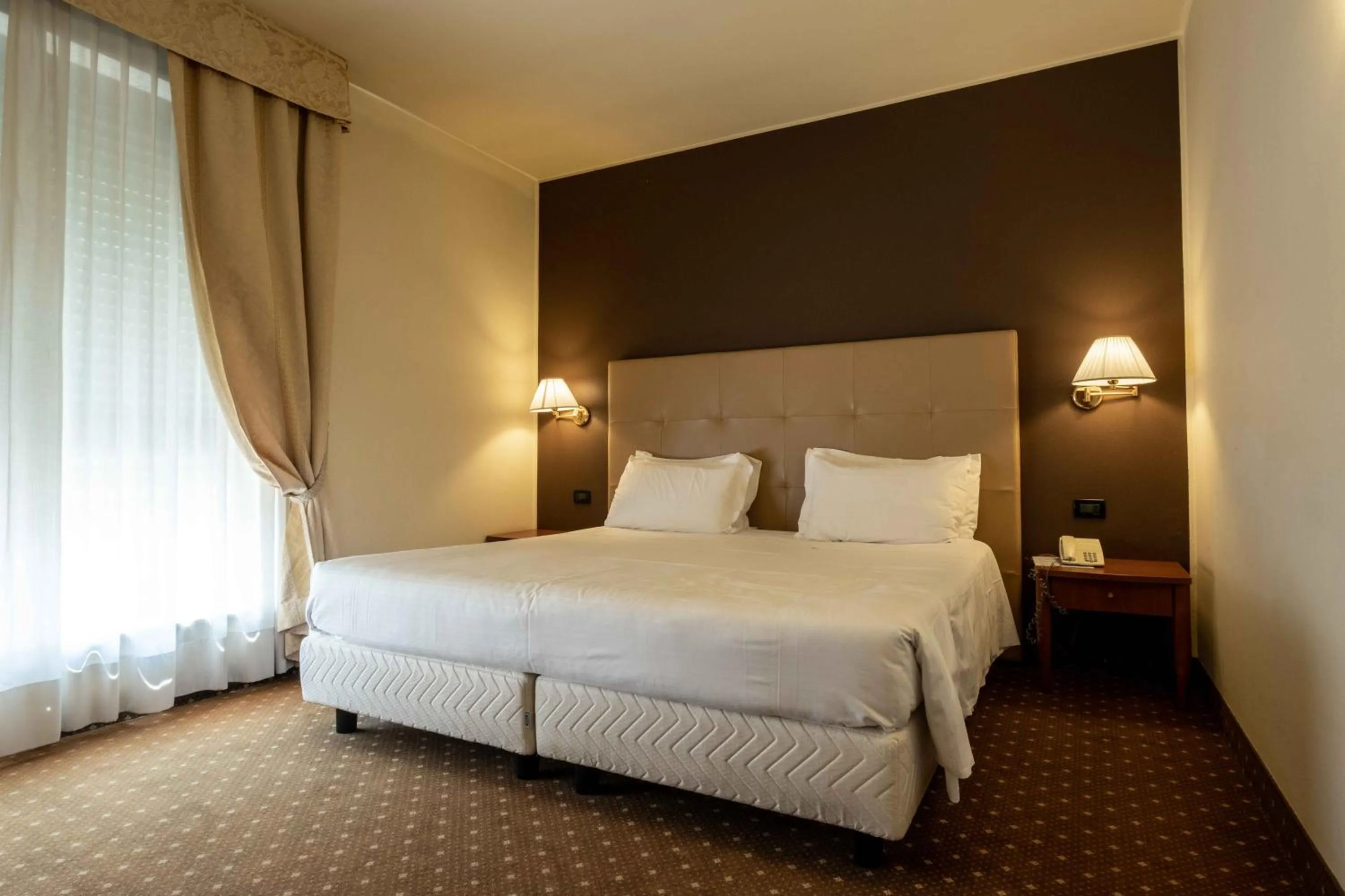 Bed in La Pieve Hotel