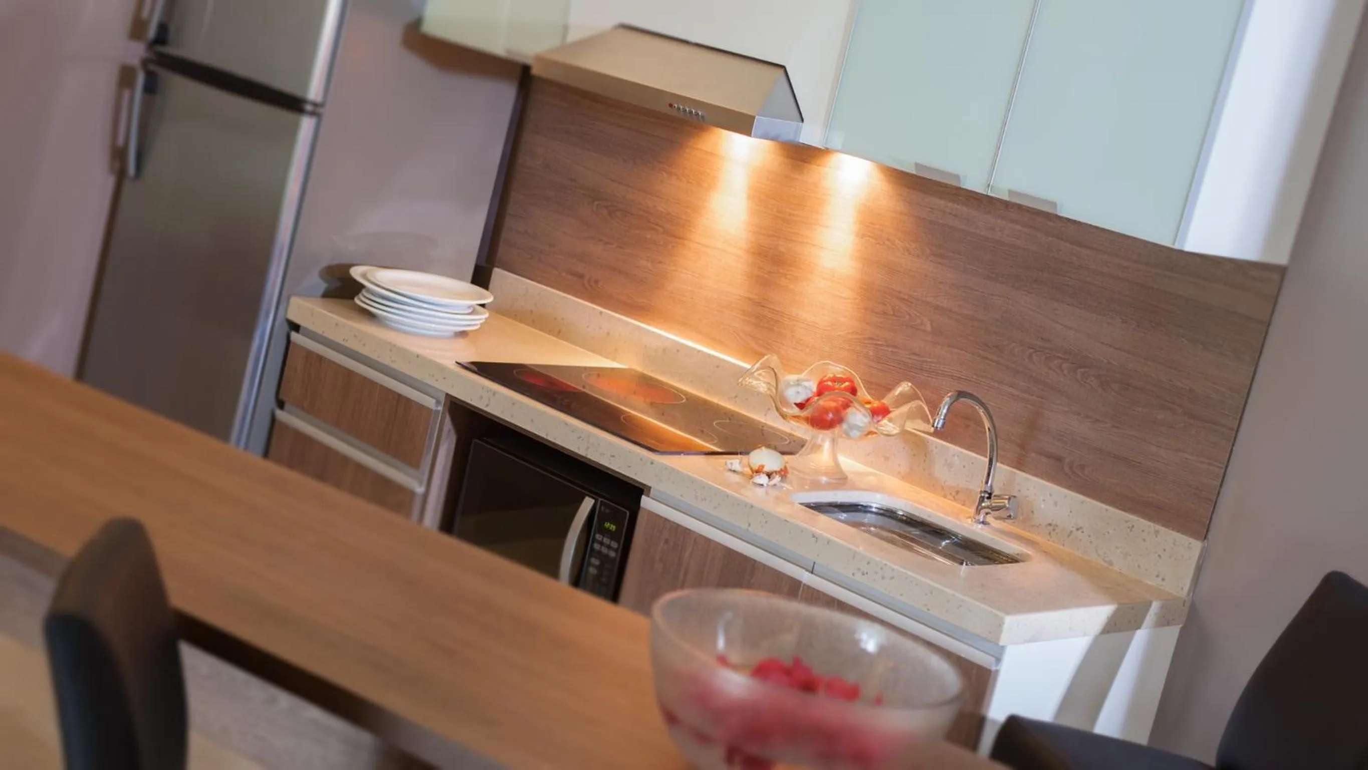 Kitchen or kitchenette in Blue Residence Hotel