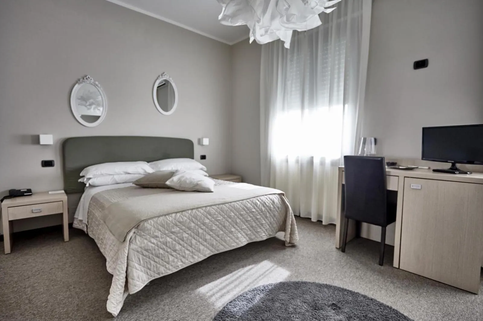 Bed in Rouge Hotel International