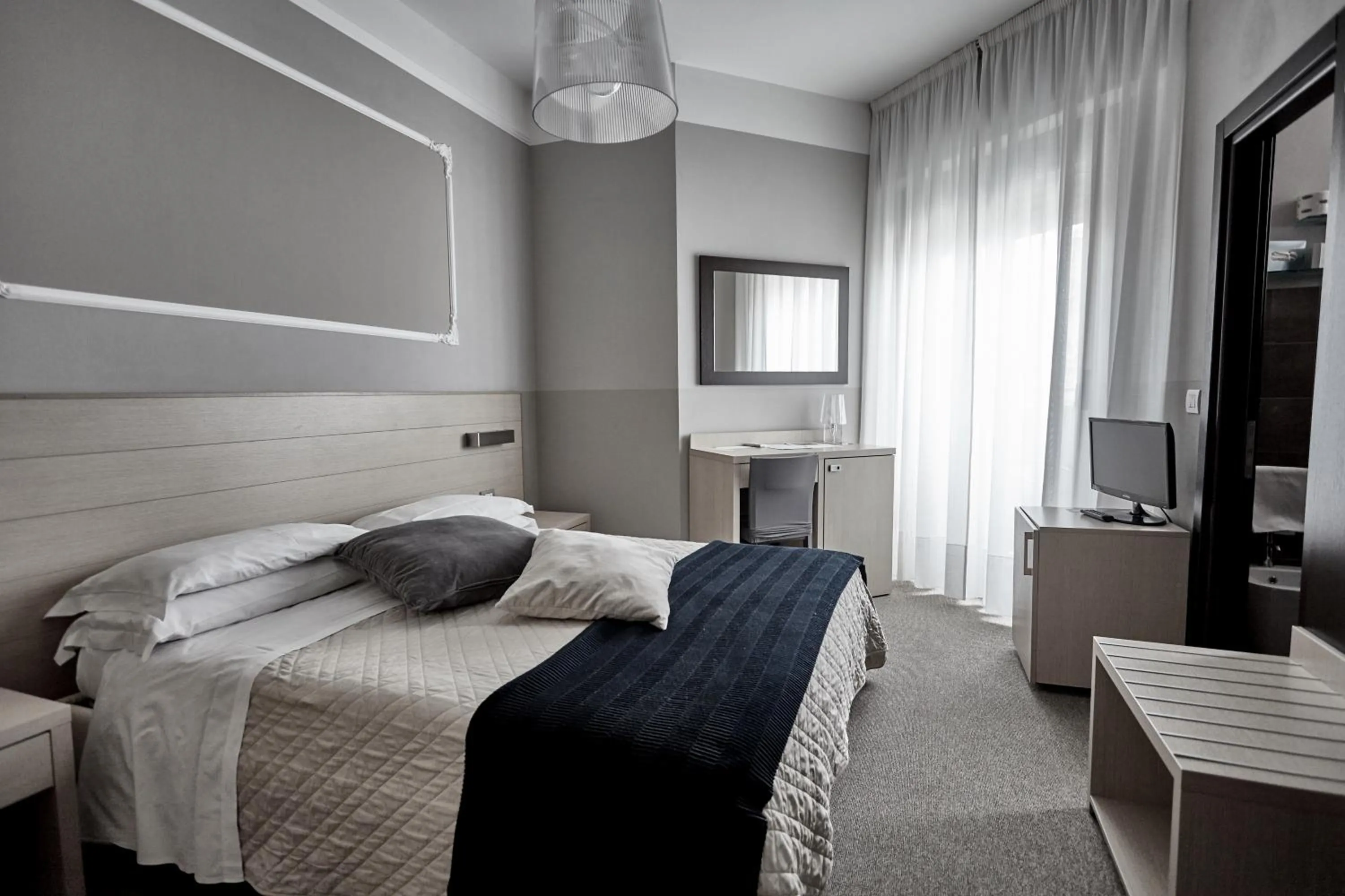 Bed in Rouge Hotel International