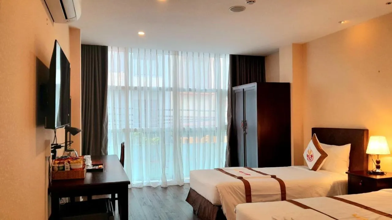 Bed in THE RICE HOTEL