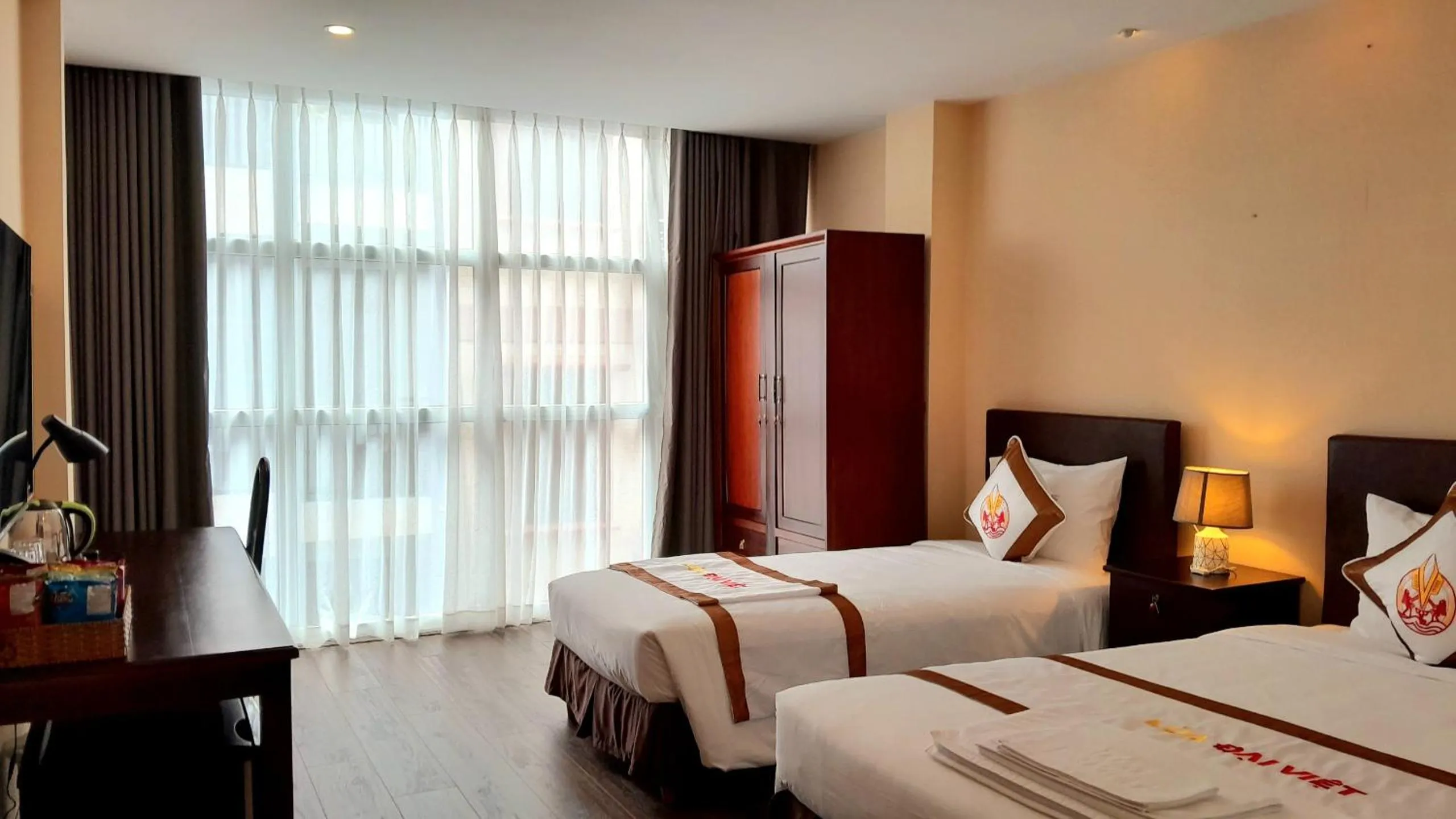 Bed in THE RICE HOTEL