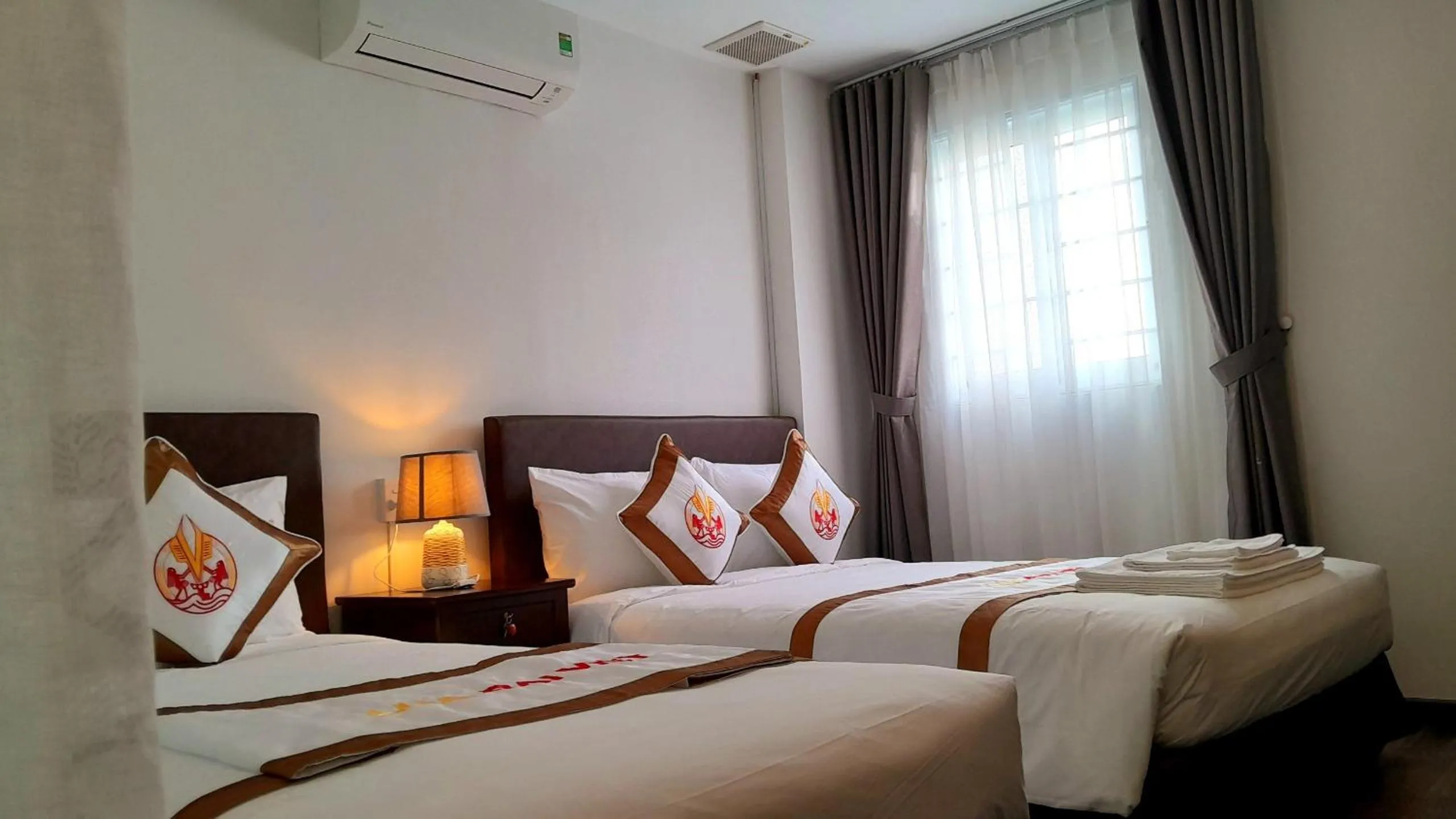 Bed in THE RICE HOTEL