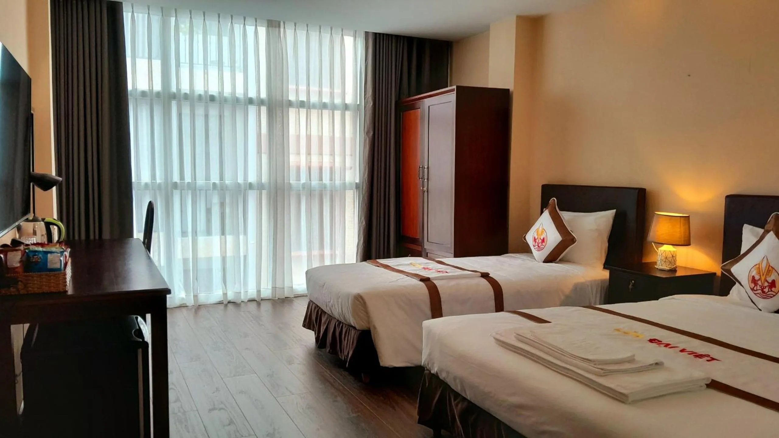 Bed in THE RICE HOTEL