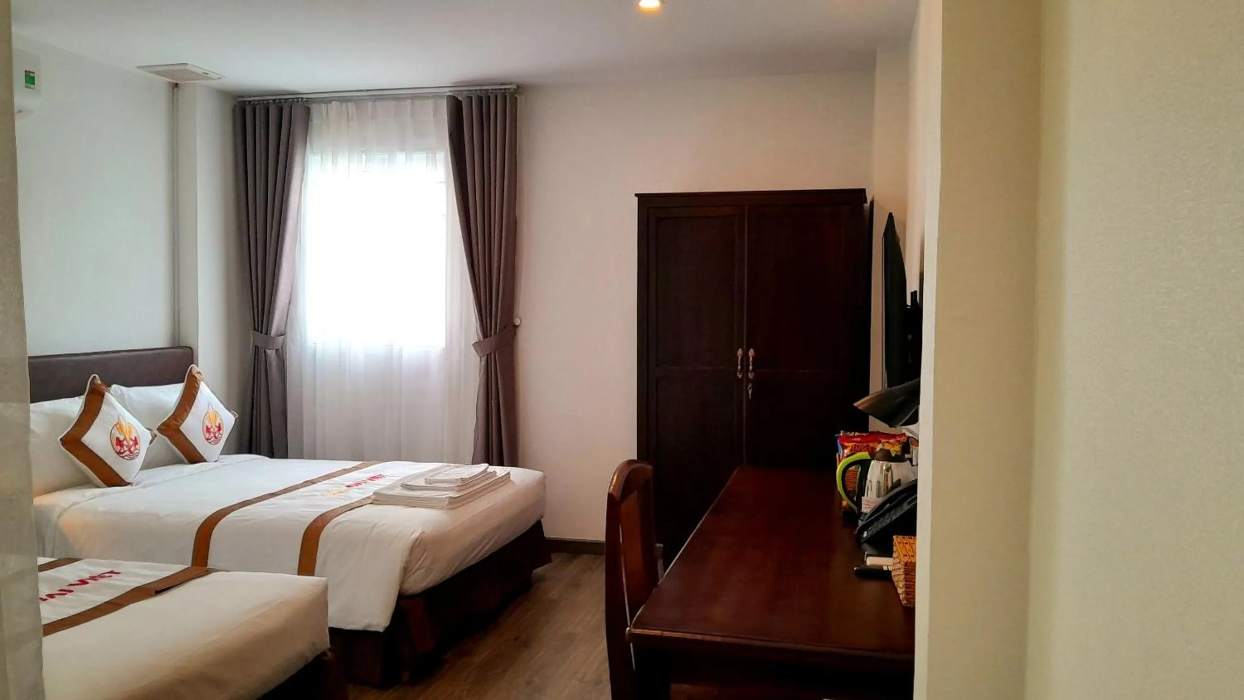 Bed in THE RICE HOTEL