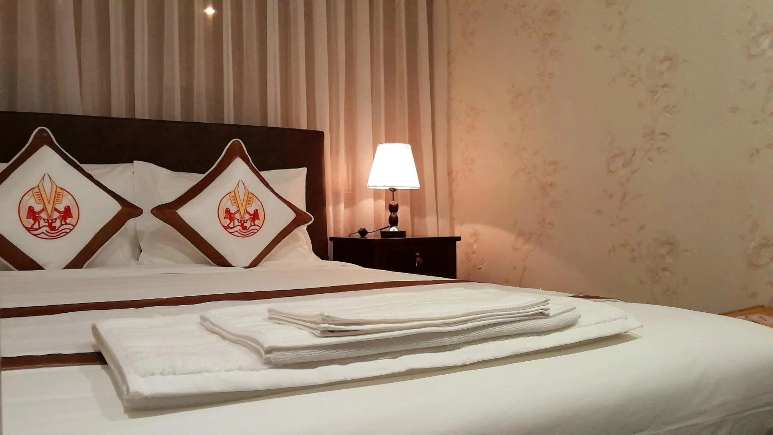 Bed in THE RICE HOTEL