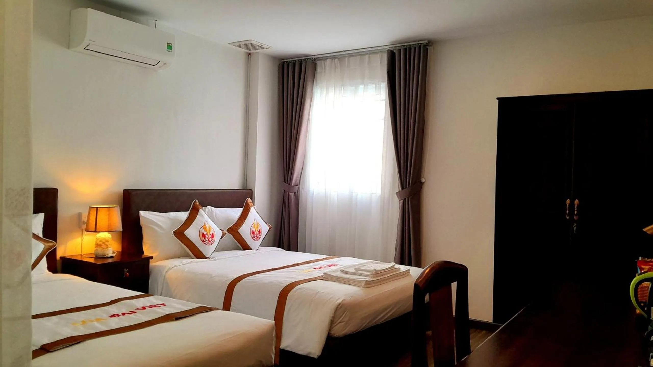 Bed in THE RICE HOTEL