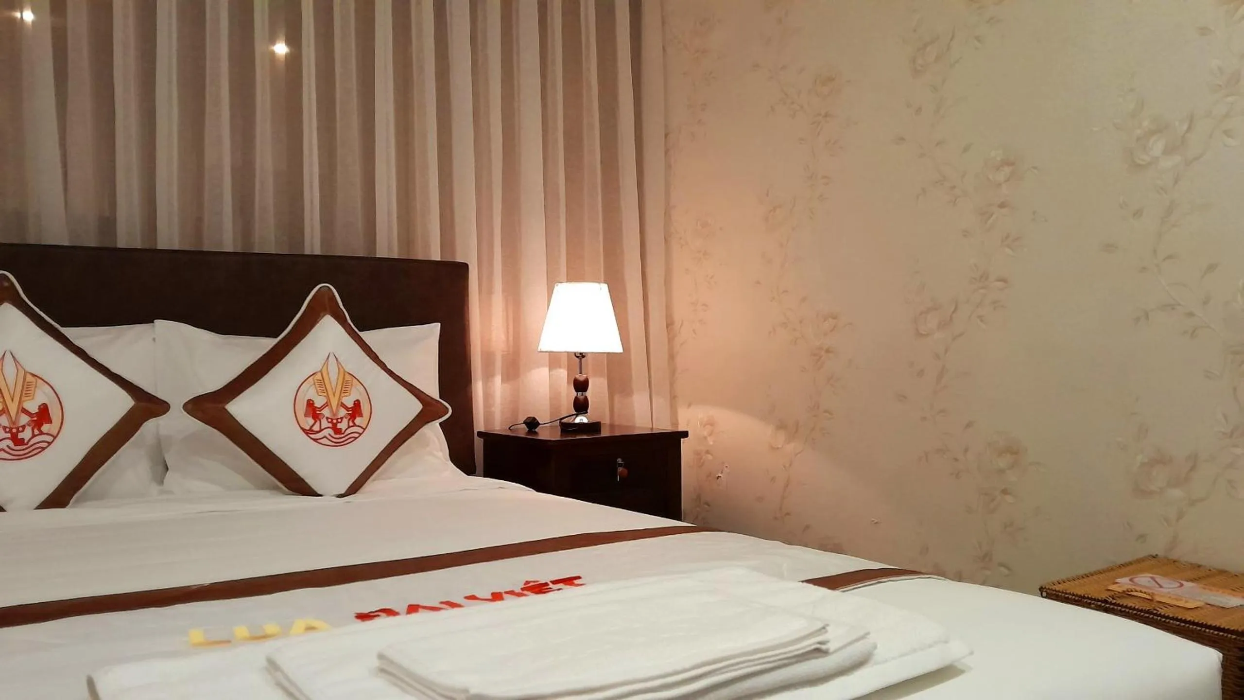 Bed in THE RICE HOTEL