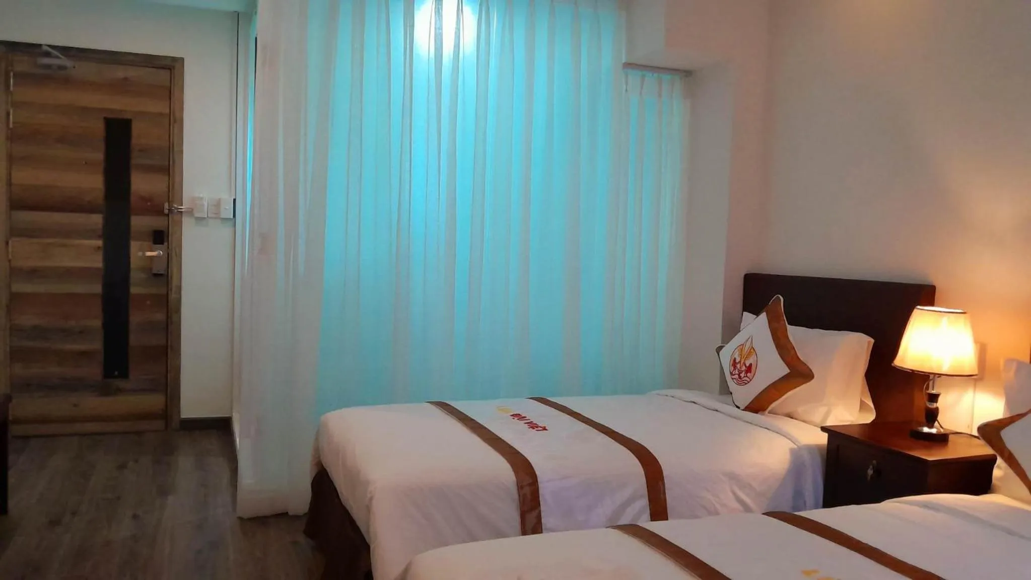 Bed in THE RICE HOTEL