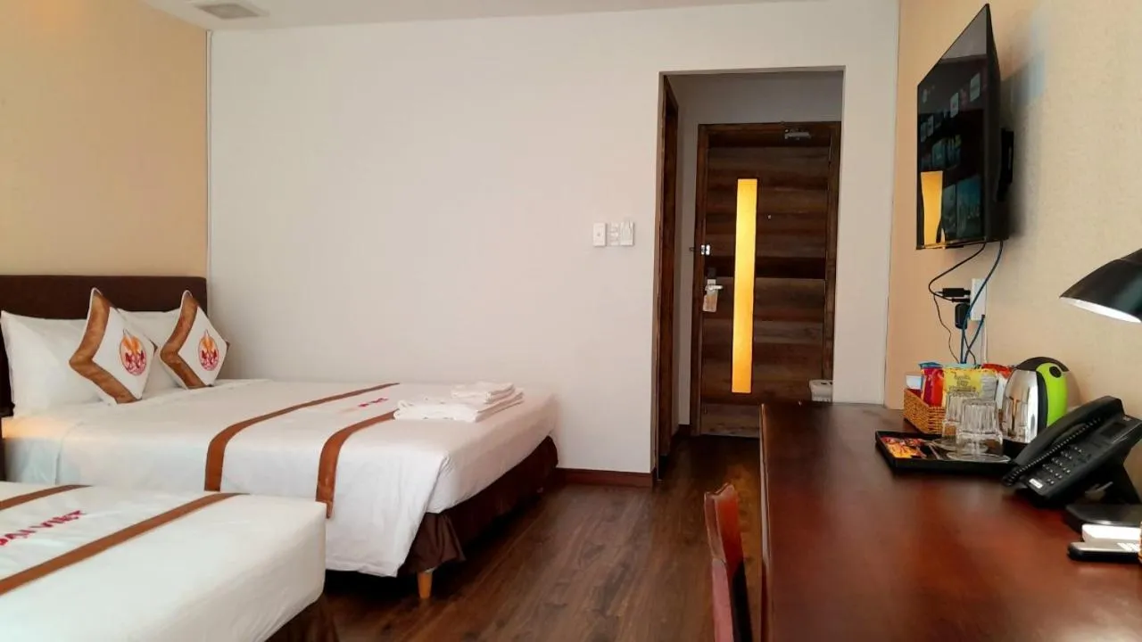 Bed in THE RICE HOTEL