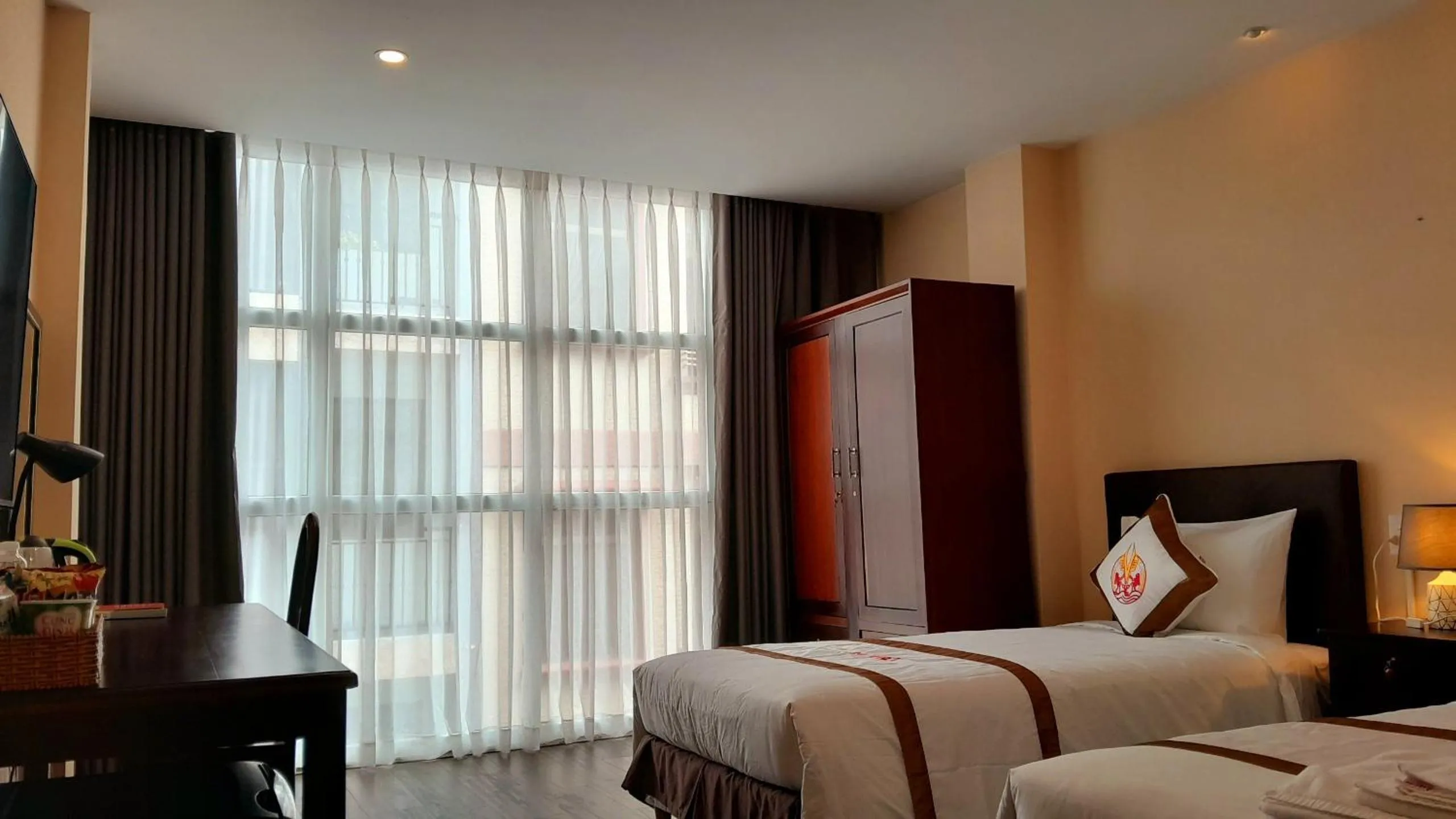 Bed in THE RICE HOTEL