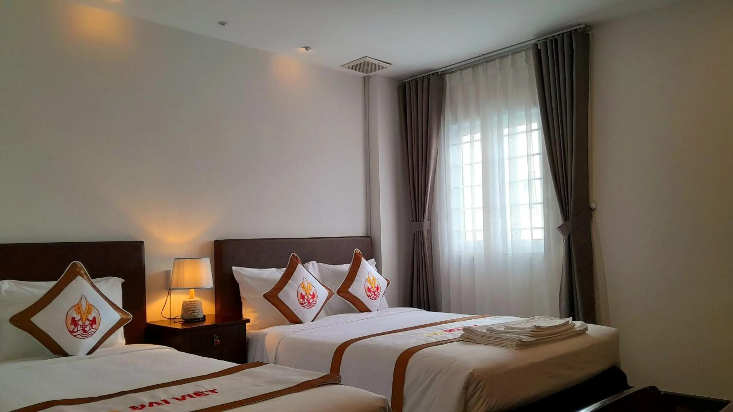 Bed in THE RICE HOTEL