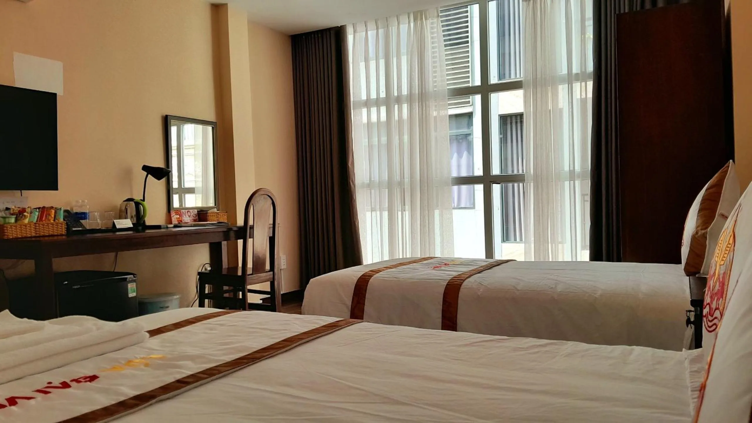 Bed in THE RICE HOTEL