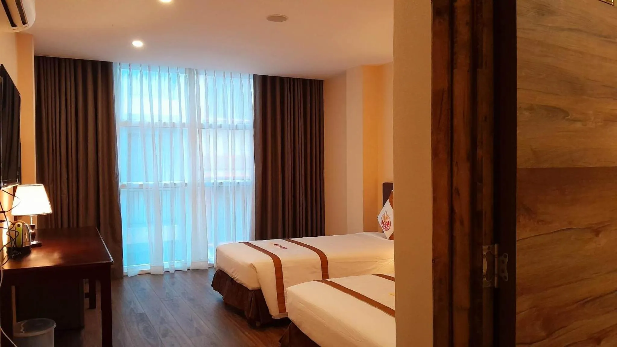 Bed in THE RICE HOTEL