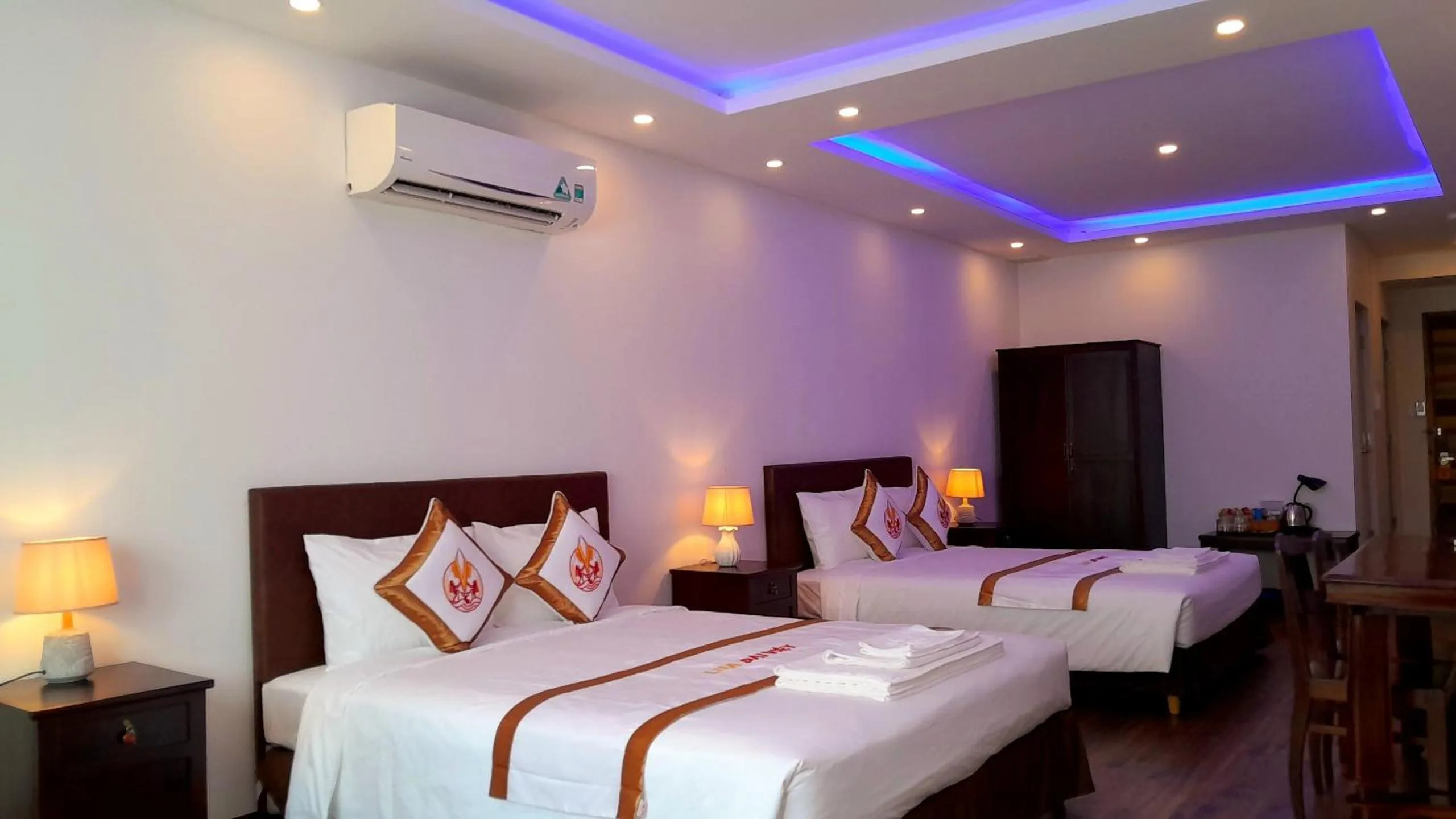 Bed in THE RICE HOTEL