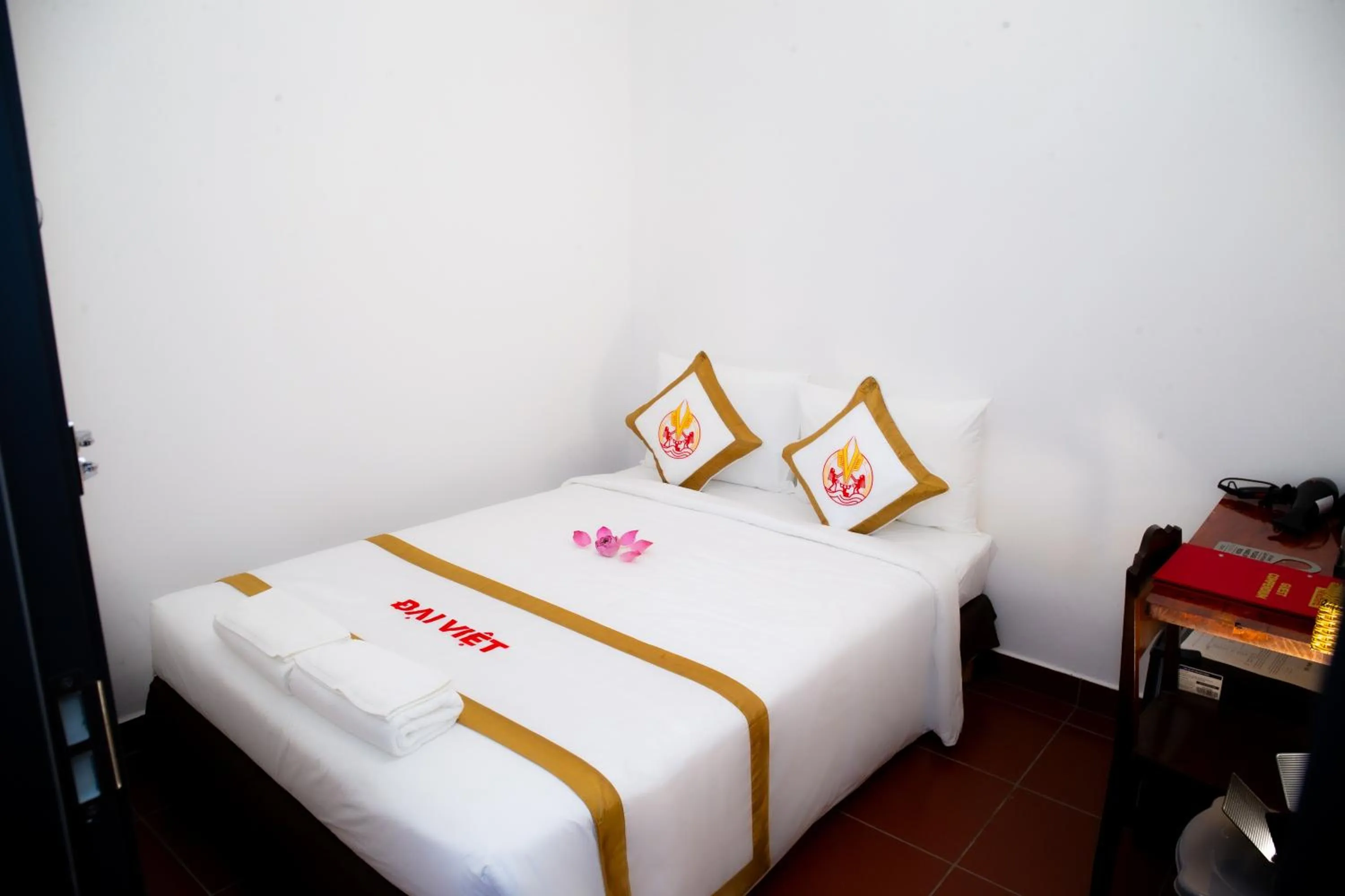 Bed in THE RICE HOTEL