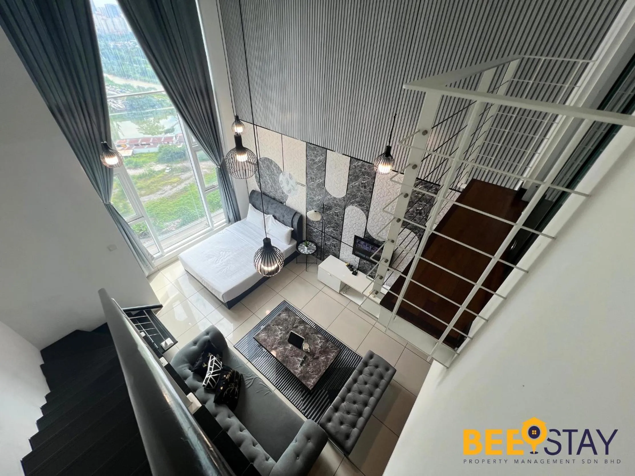 Living room in The Scott Garden Kuala Lumpur by BeeStay Management