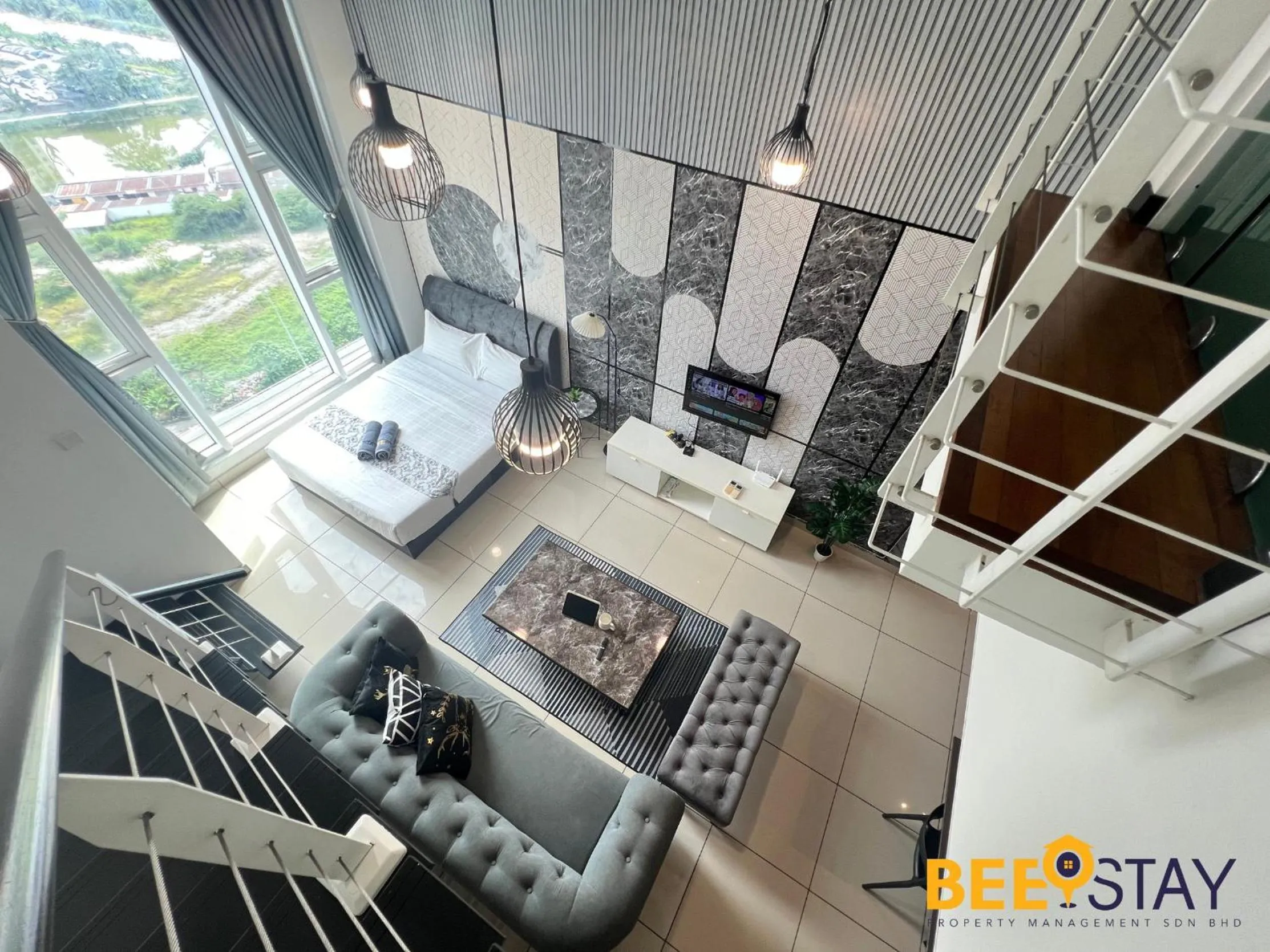 Living room in The Scott Garden Kuala Lumpur by BeeStay Management