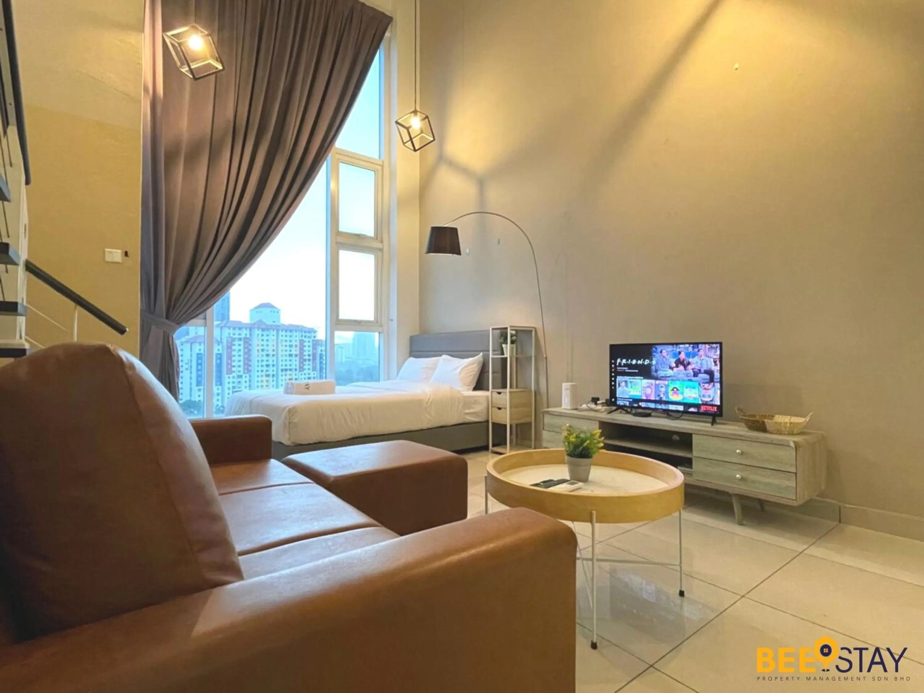 Living room, Bed in The Scott Garden Kuala Lumpur by BeeStay Management